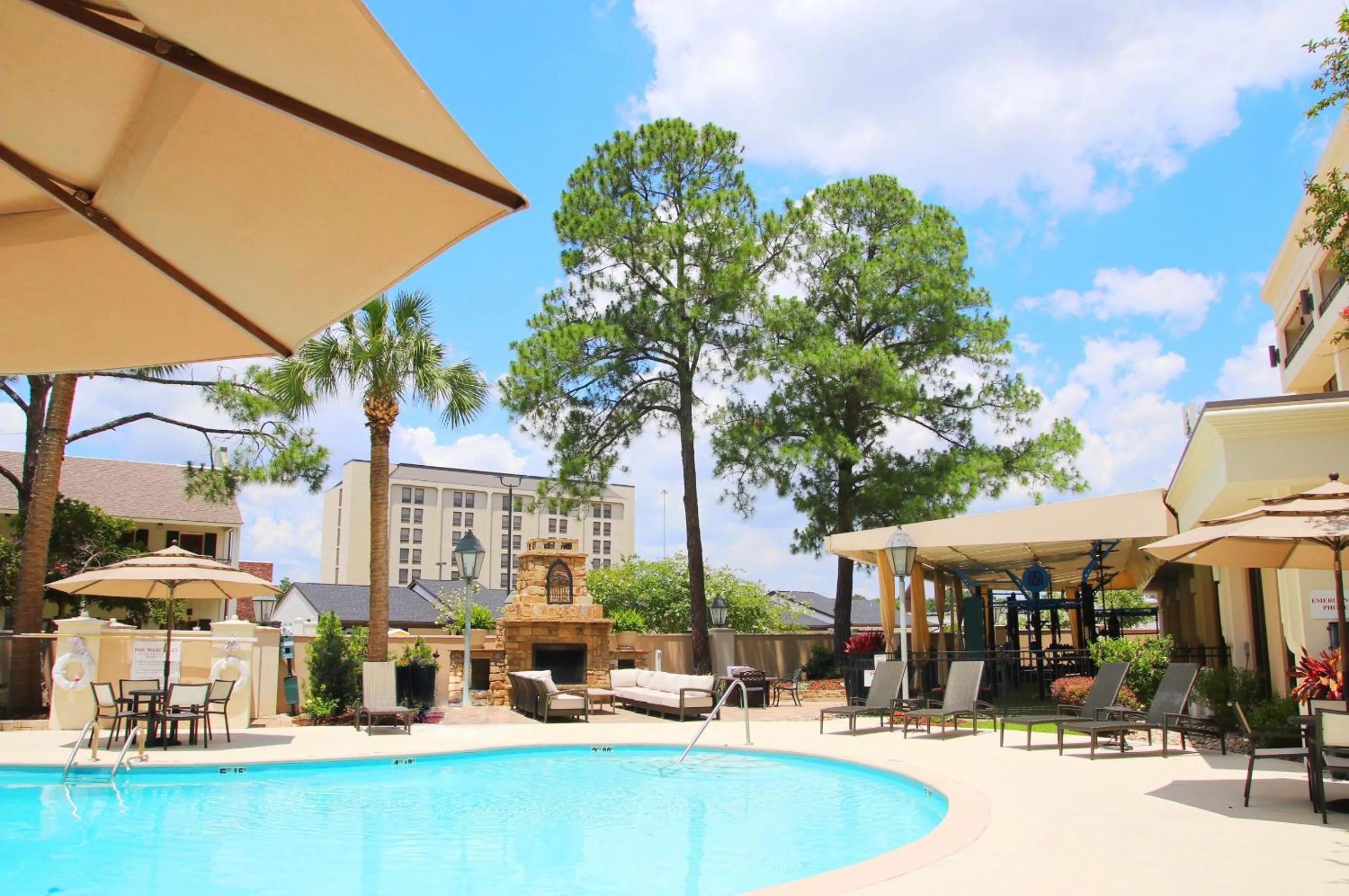 Swimming pool in Crowne Plaza Executive Center Baton Rouge by IHG
