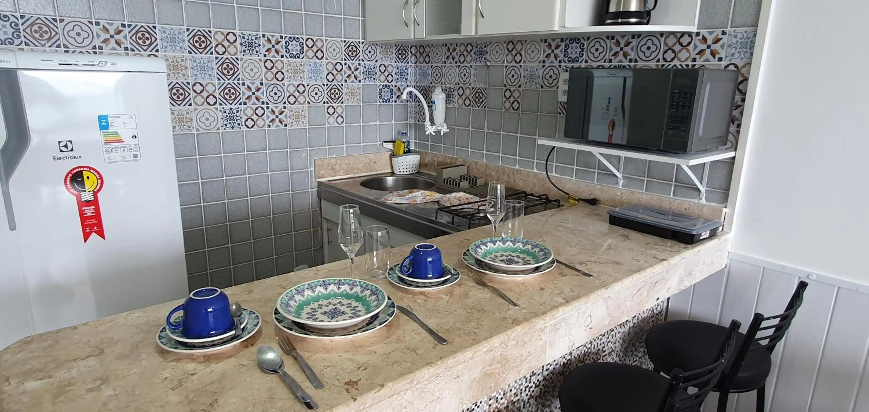 Kitchen or kitchenette in Farol Barra Flat