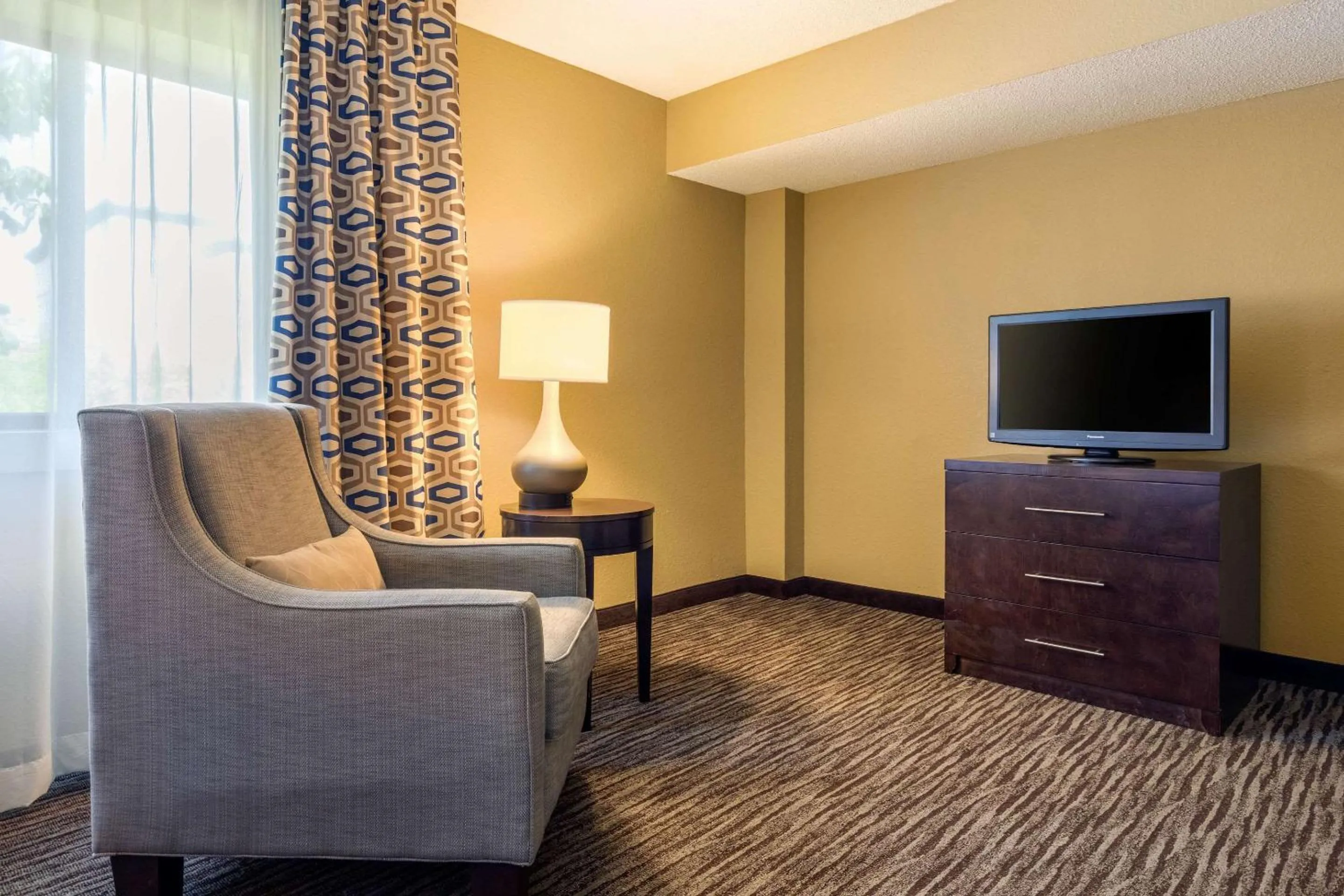 Bedroom in Suburban Studios Arlington Heights Elk Grove