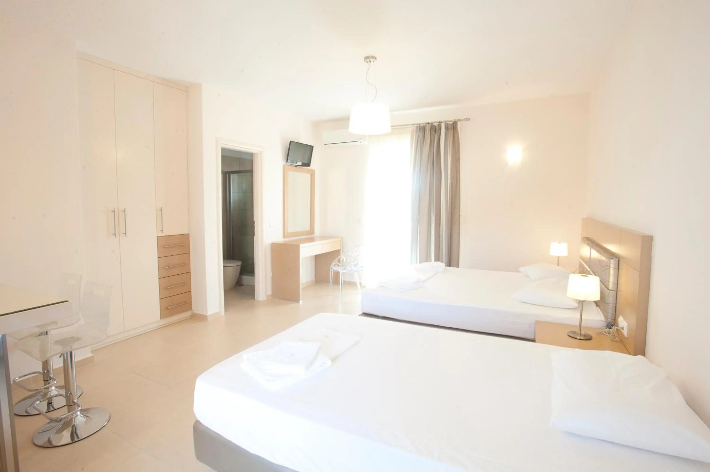 Property building, Bed in Georgio Seaside Hotel