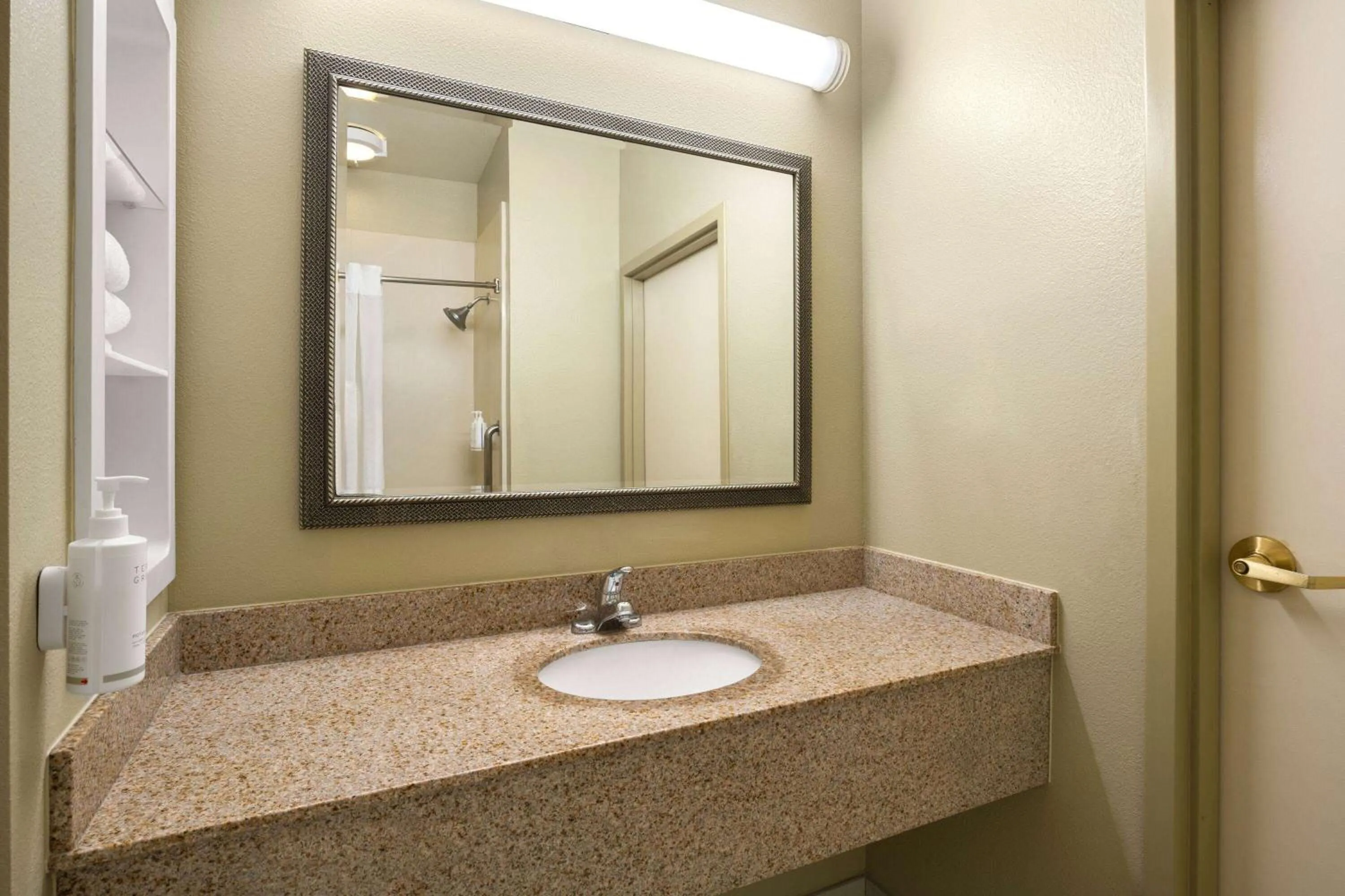 TV and multimedia in Hotel Marguerite South Anaheim - Garden Grove, Trademark Collection by Wyndham