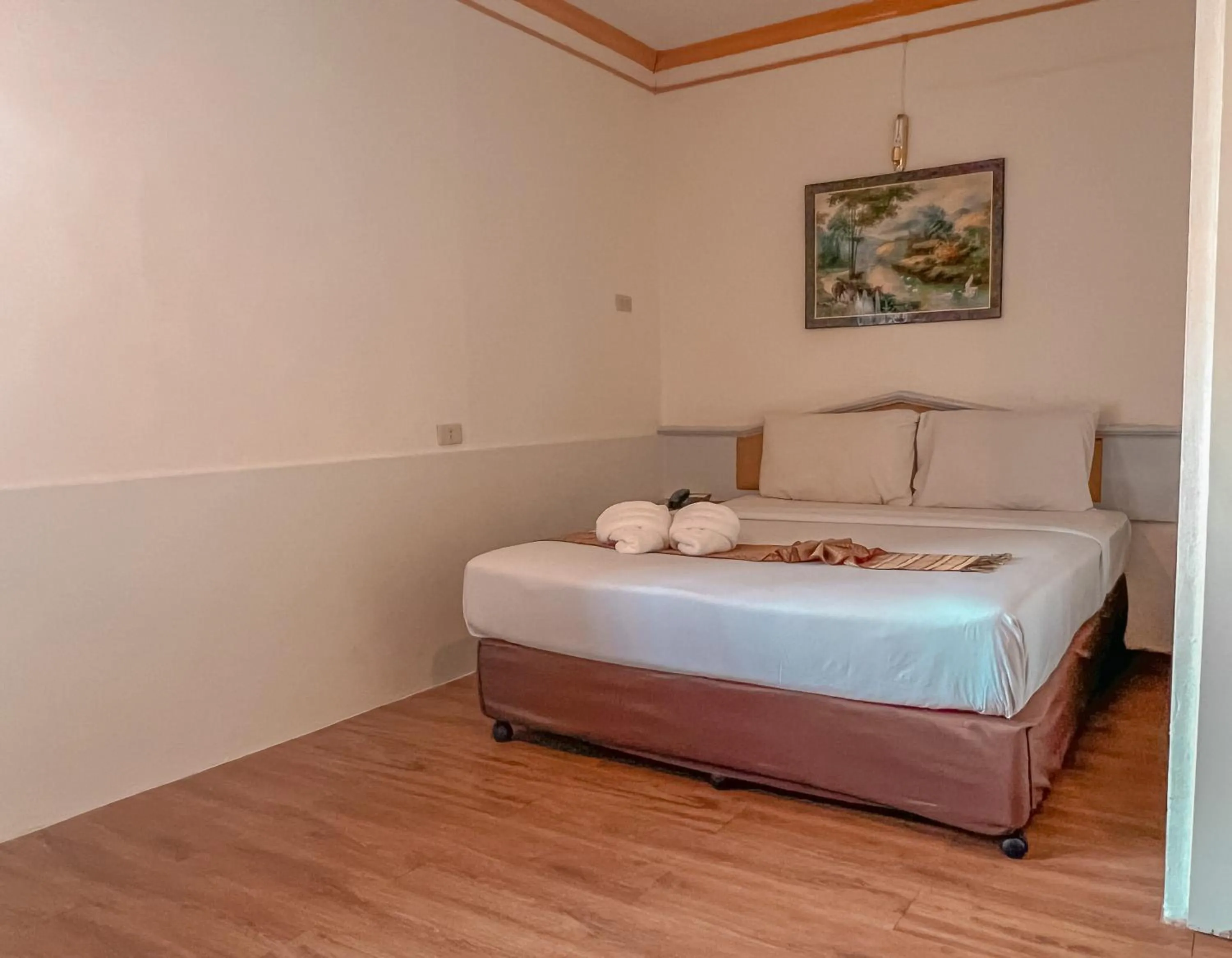 Bed in Merlin Grand Hotel