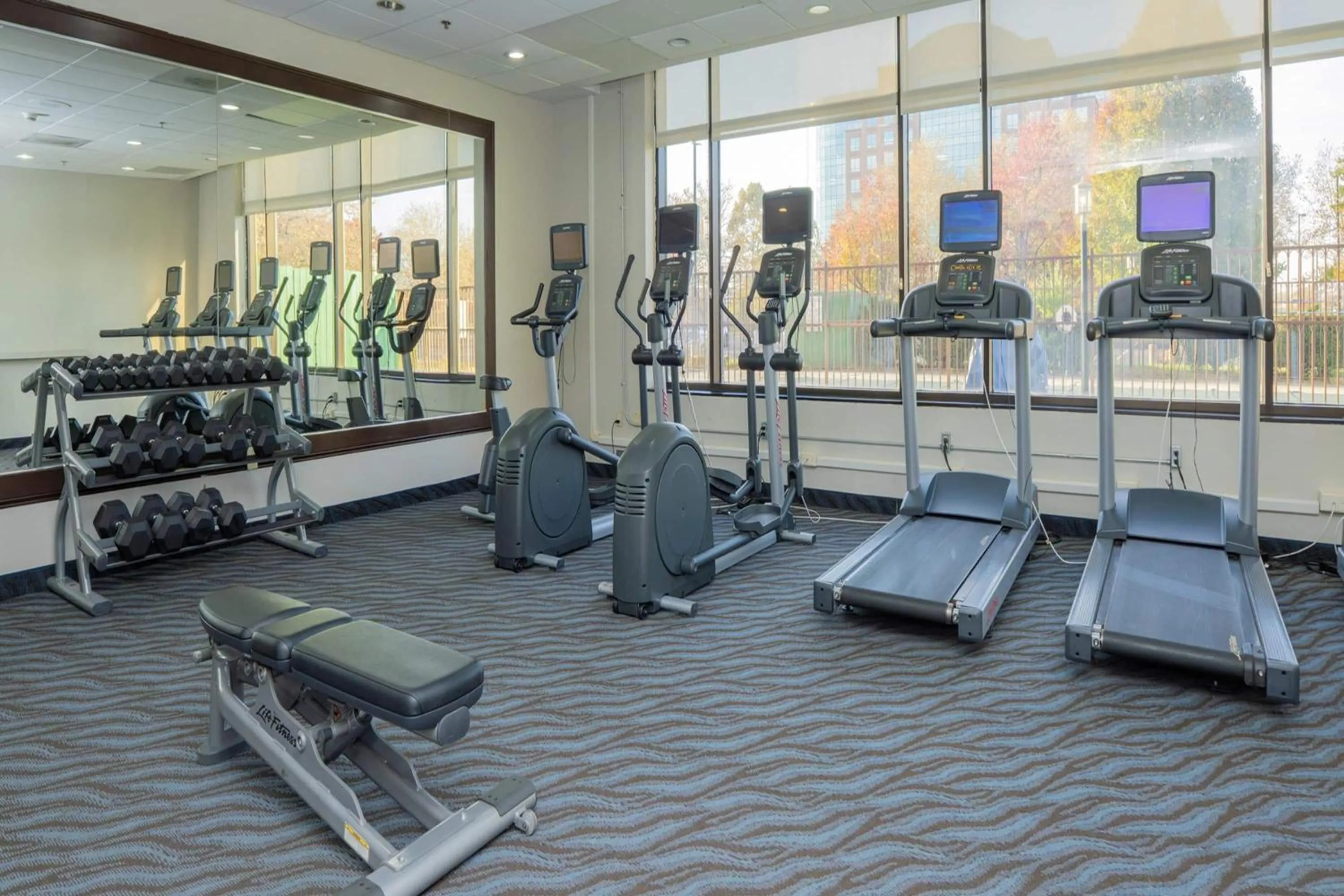 Fitness centre/facilities in Elimwood Hotel, a Ramada by Wyndham