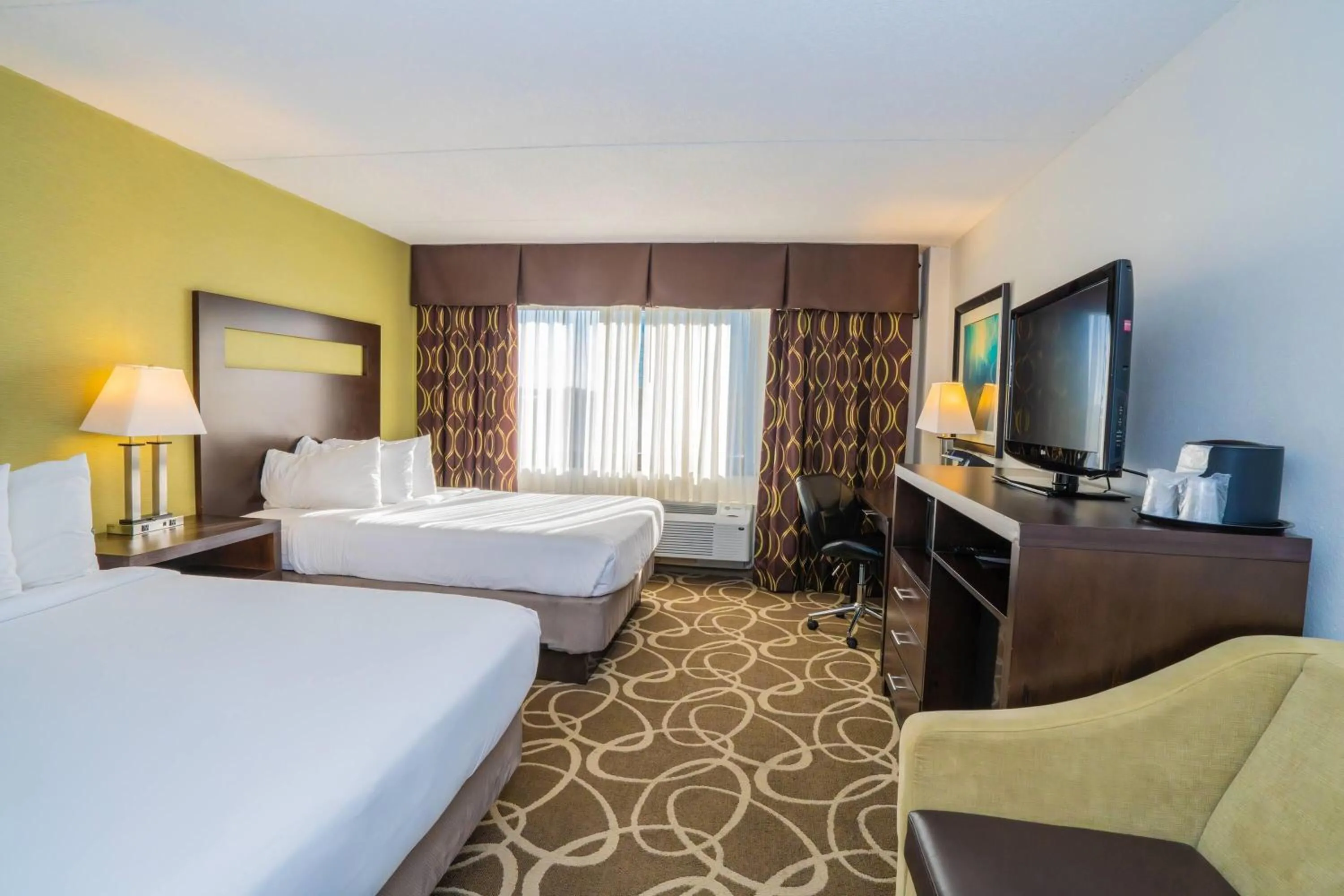 Photo of the whole room, Bed in Elimwood Hotel, a Ramada by Wyndham