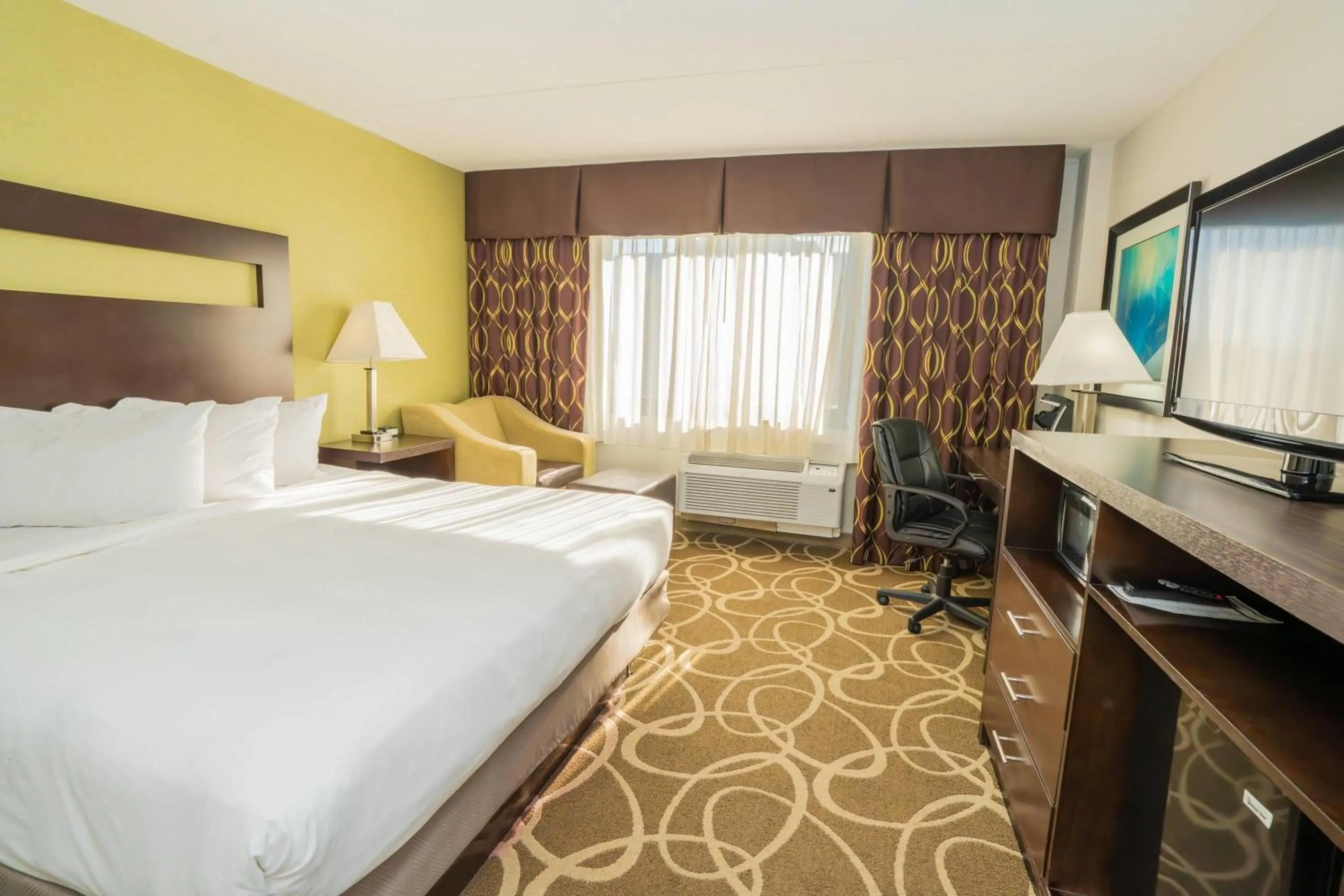 Photo of the whole room, Bed in Elimwood Hotel, a Ramada by Wyndham