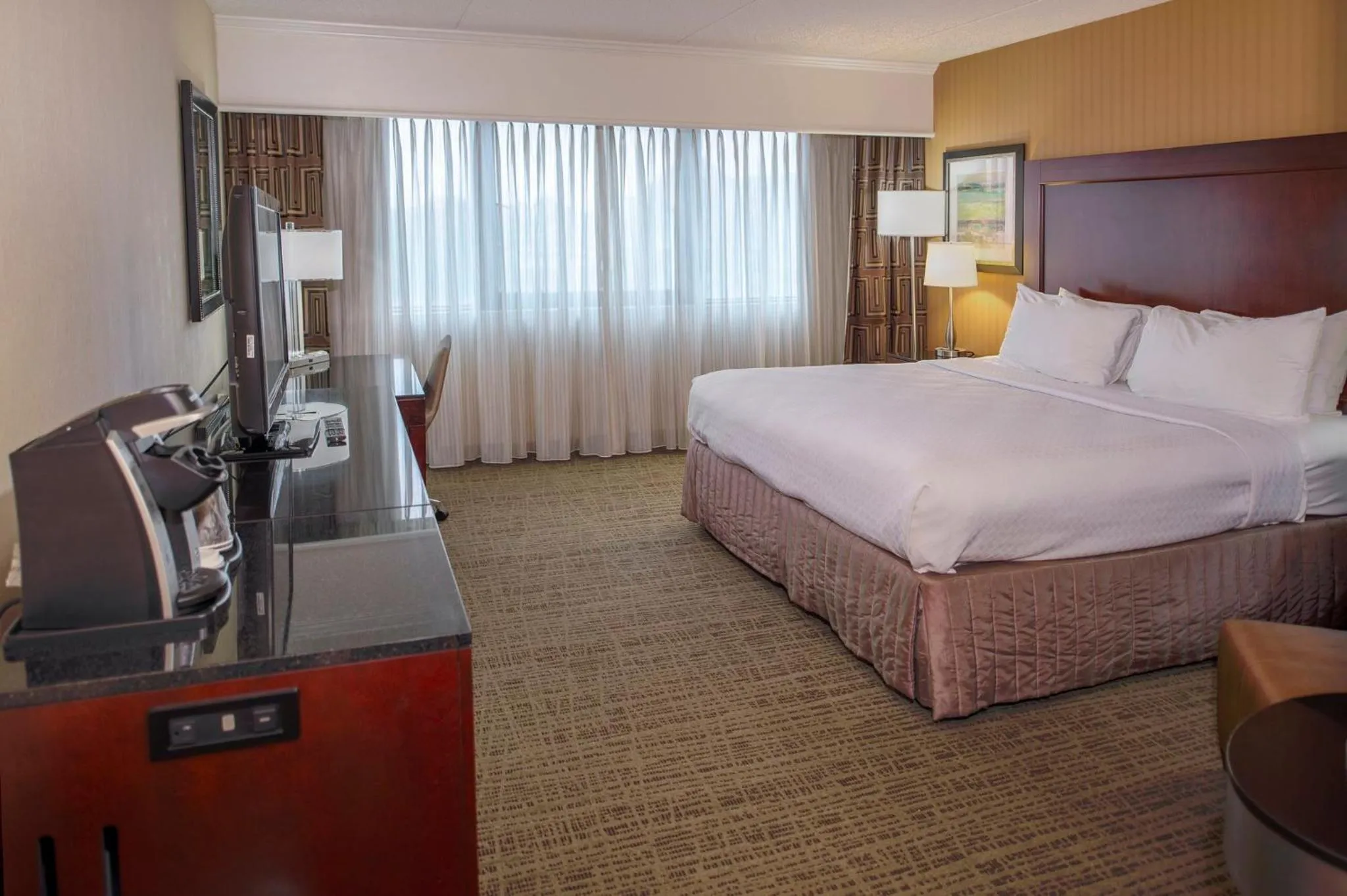 Photo of the whole room, Bed in Crowne Plaza Hotel St. Louis Airport by IHG
