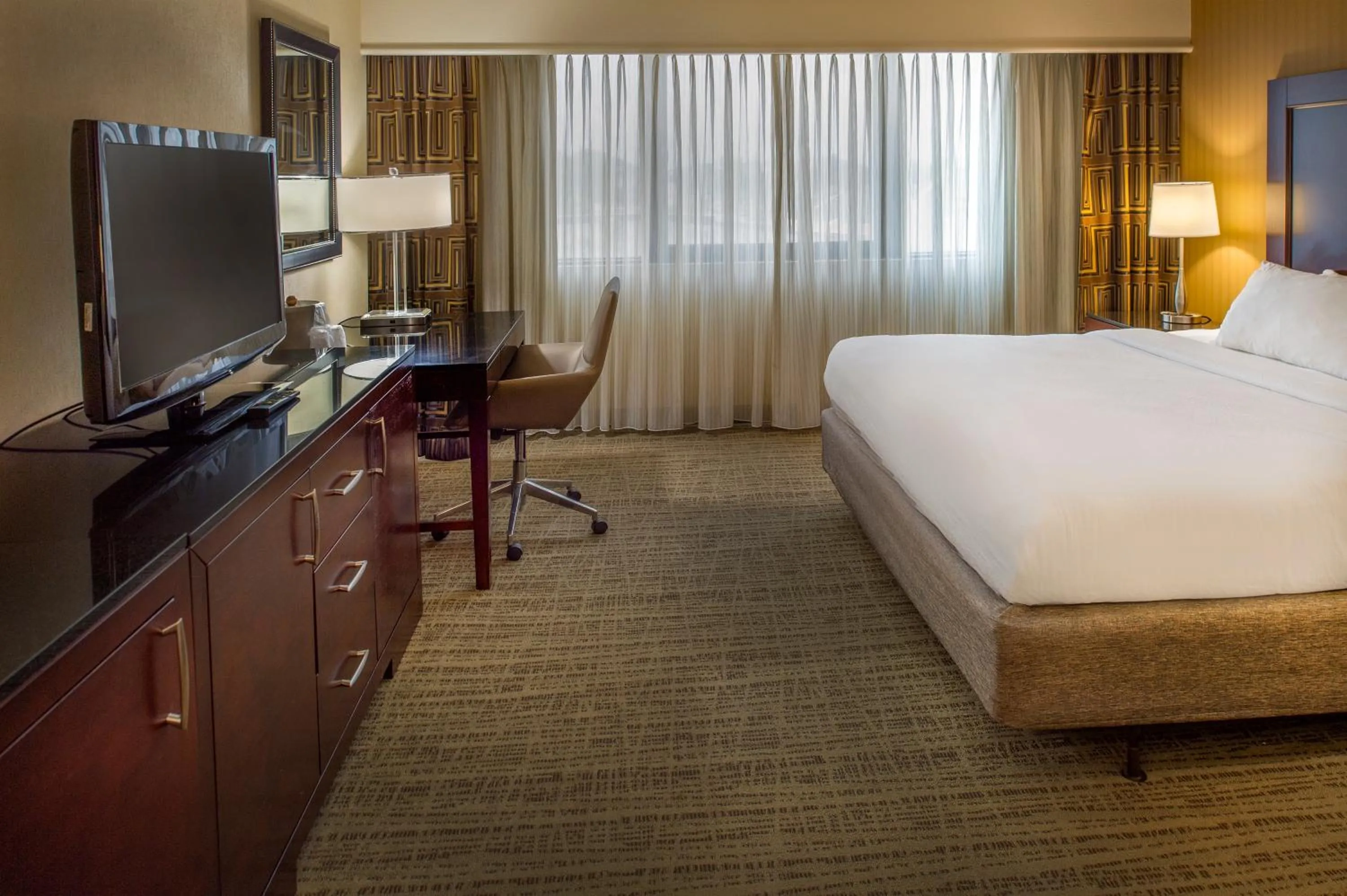 Bed in Crowne Plaza Hotel St. Louis Airport by IHG