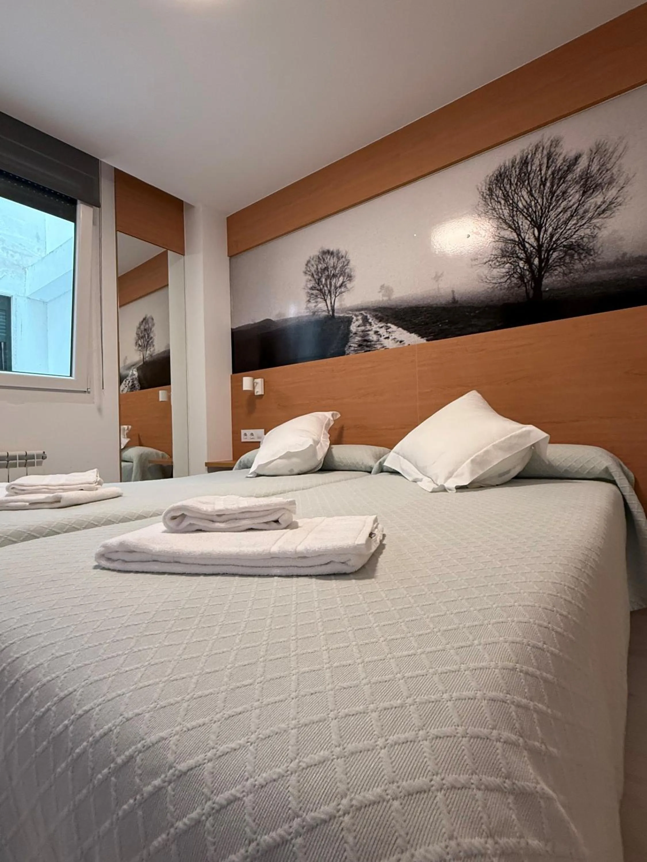 Bed in Pension Restaurante Casa Camiño