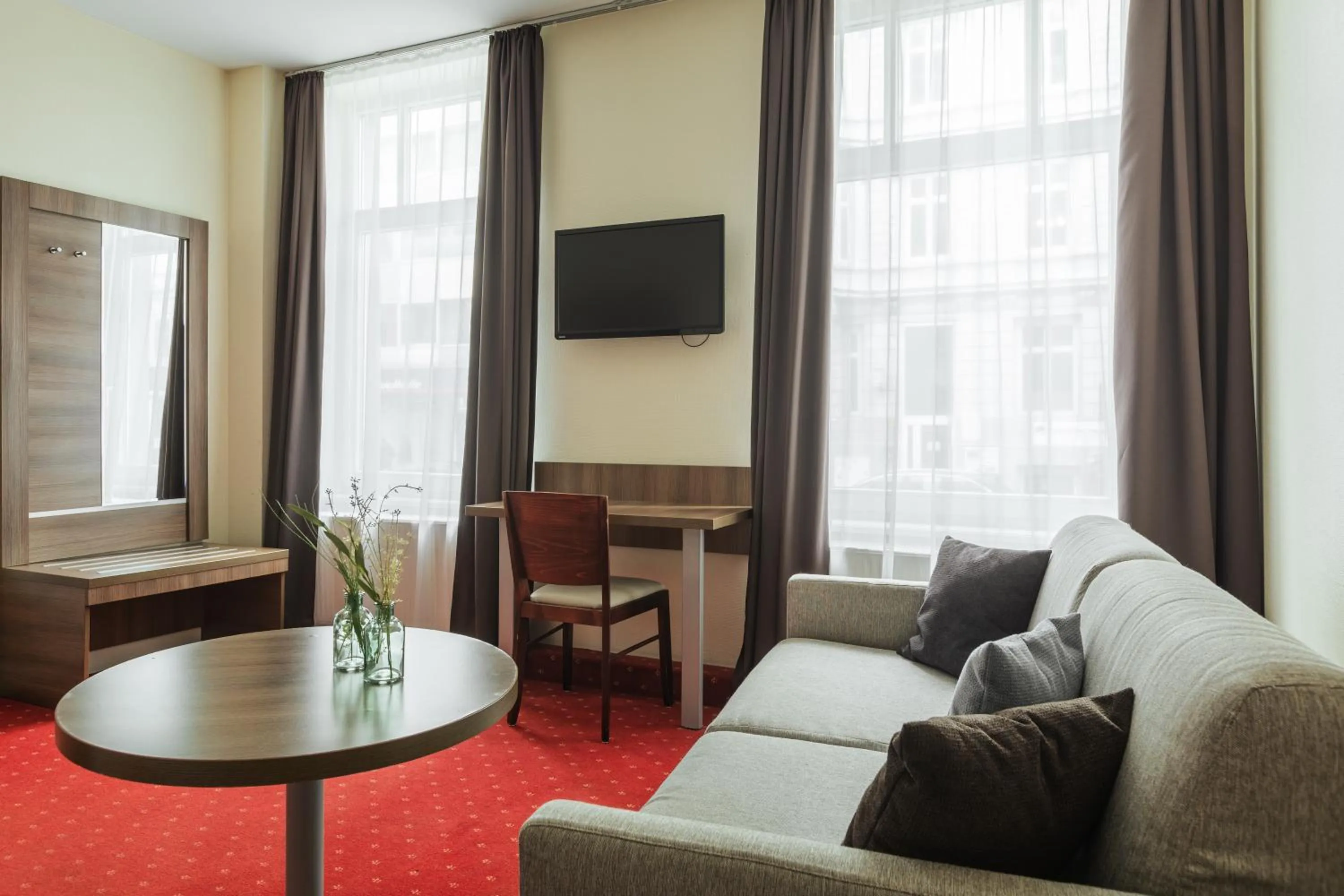 TV and multimedia in acora City Apart Living the City