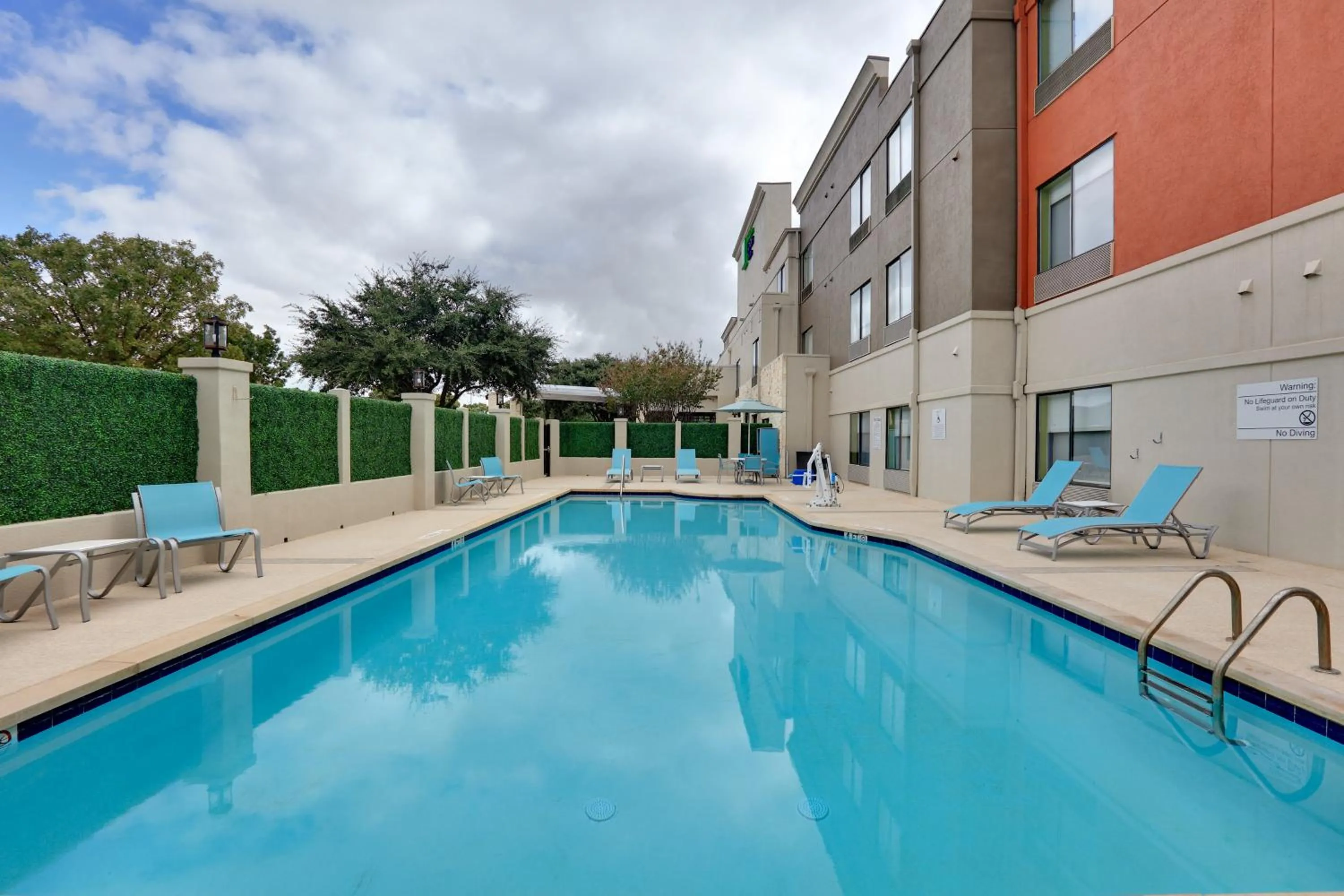 Swimming pool in Holiday Inn Express & Suites - Austin - Round Rock by IHG