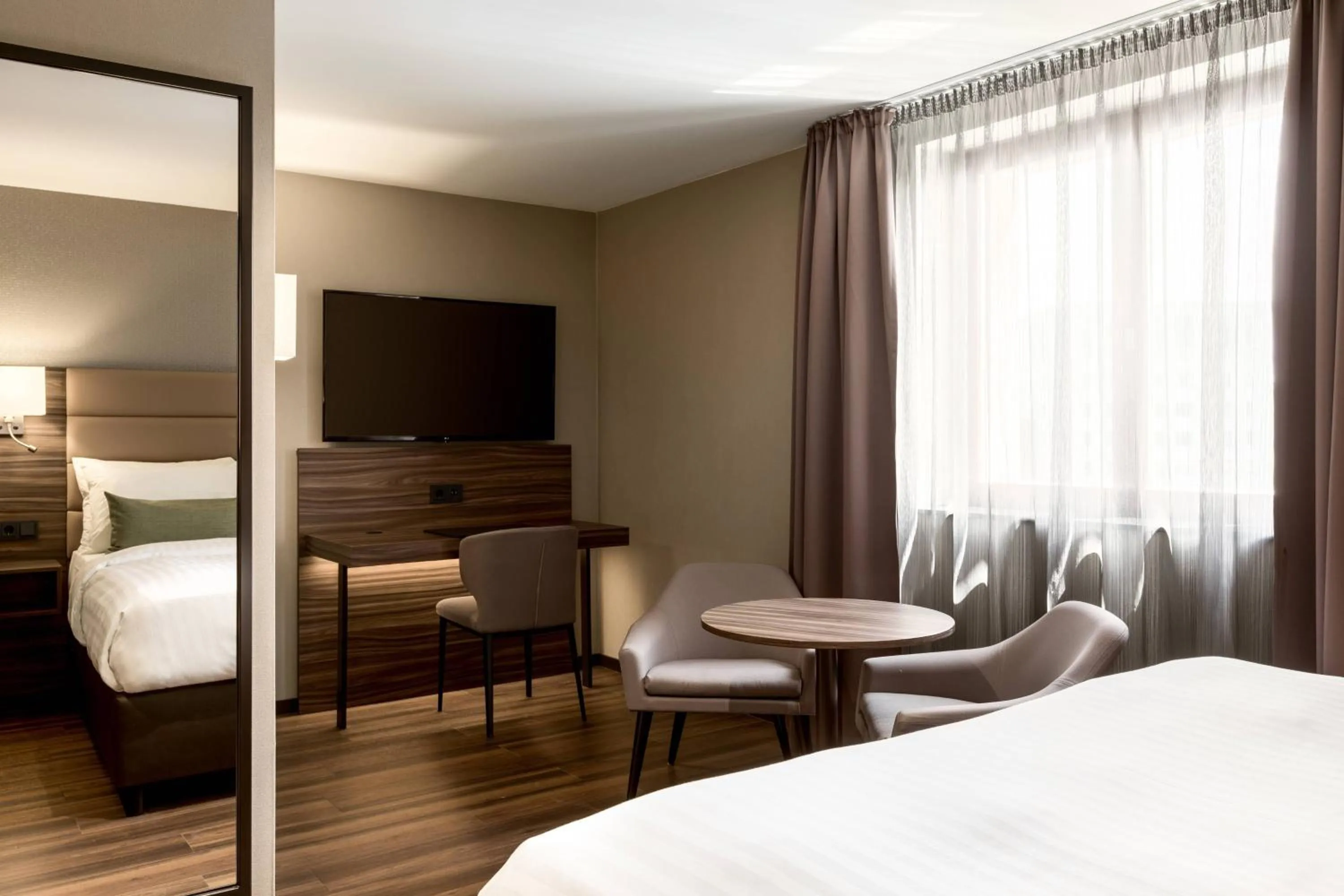 Living room, Bed in AC Hotel by Marriott Mainz