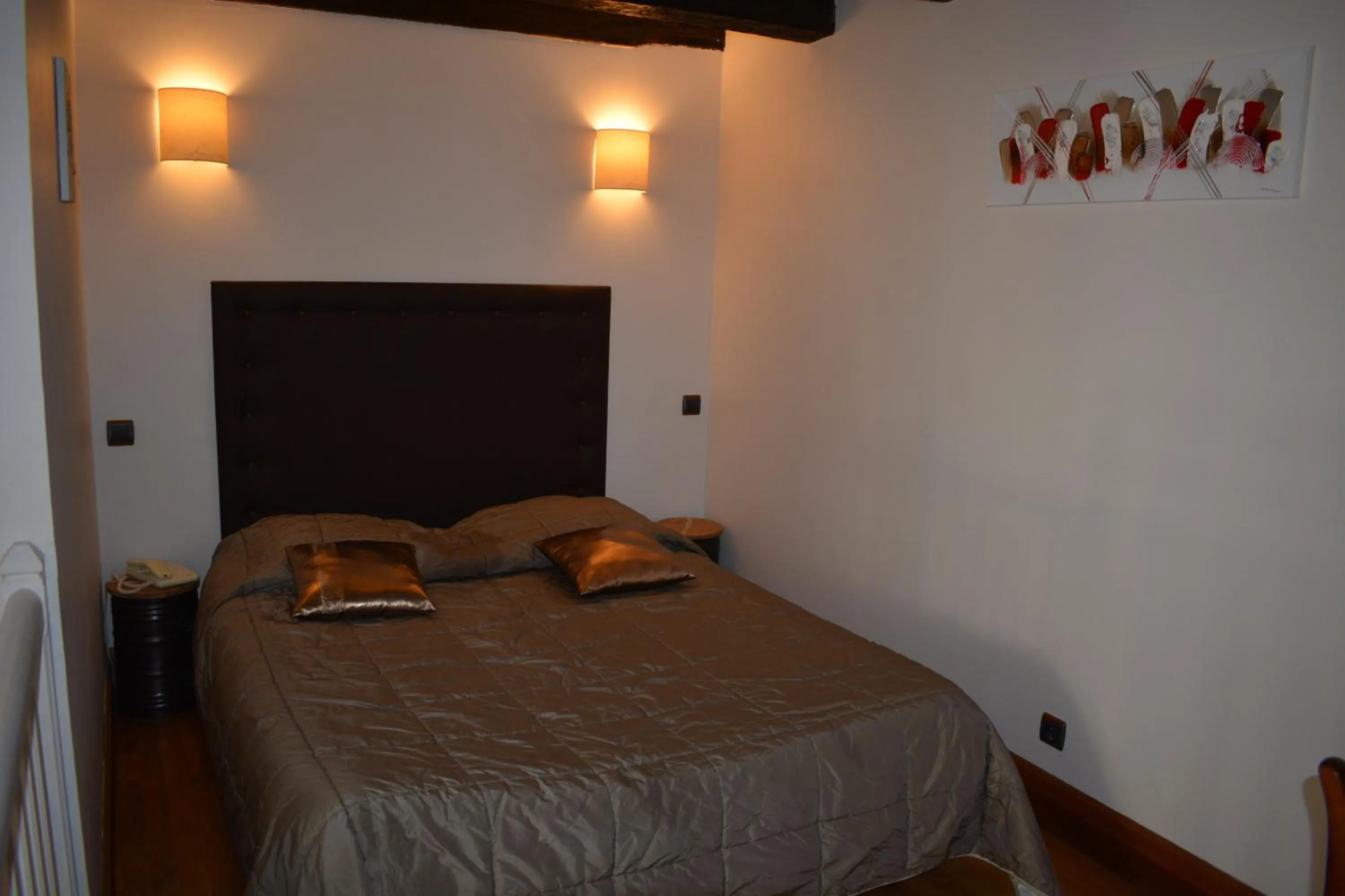 Bed in Hotel des Consuls