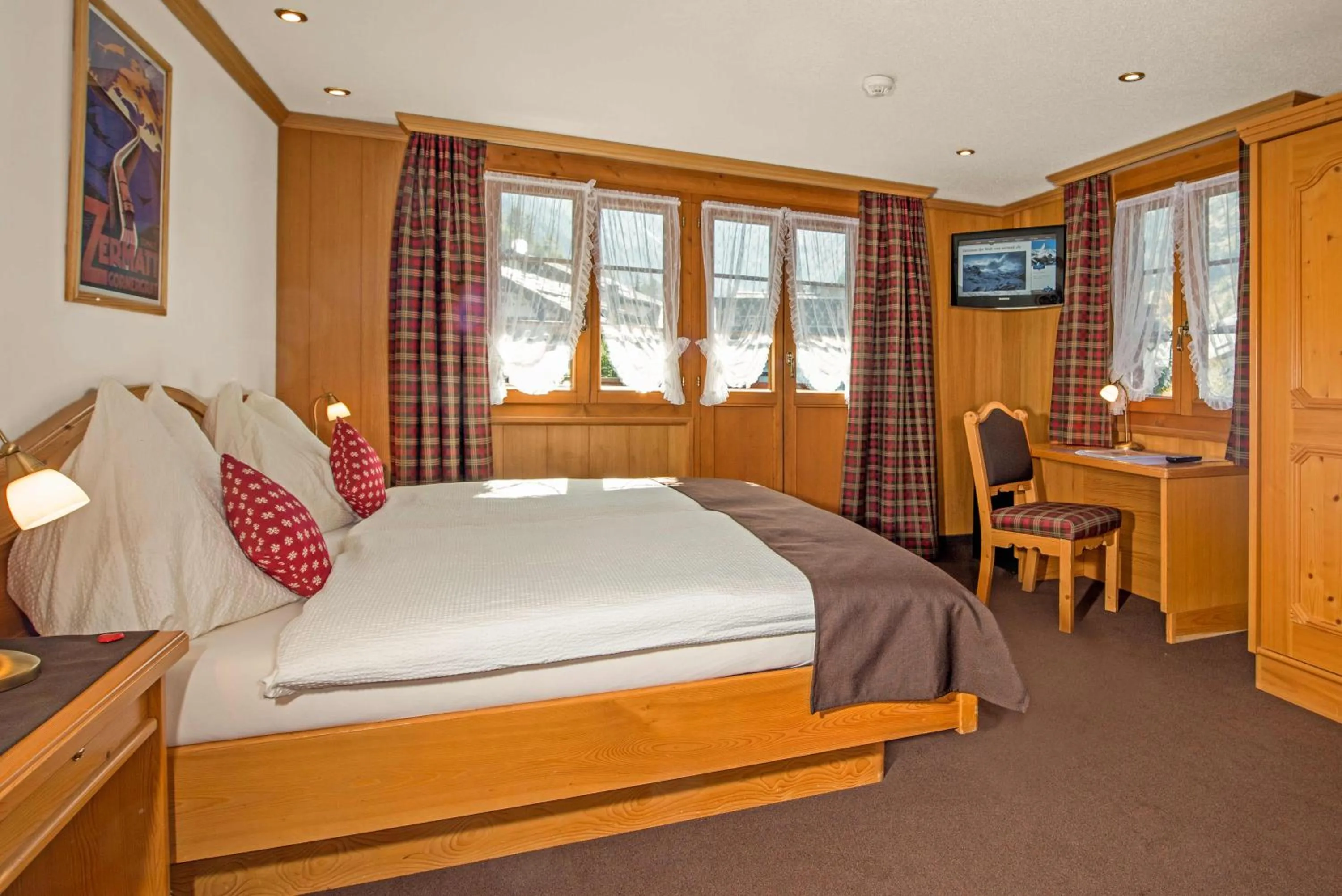 Photo of the whole room in Hotel Dufour Alpin Superior - Adults only