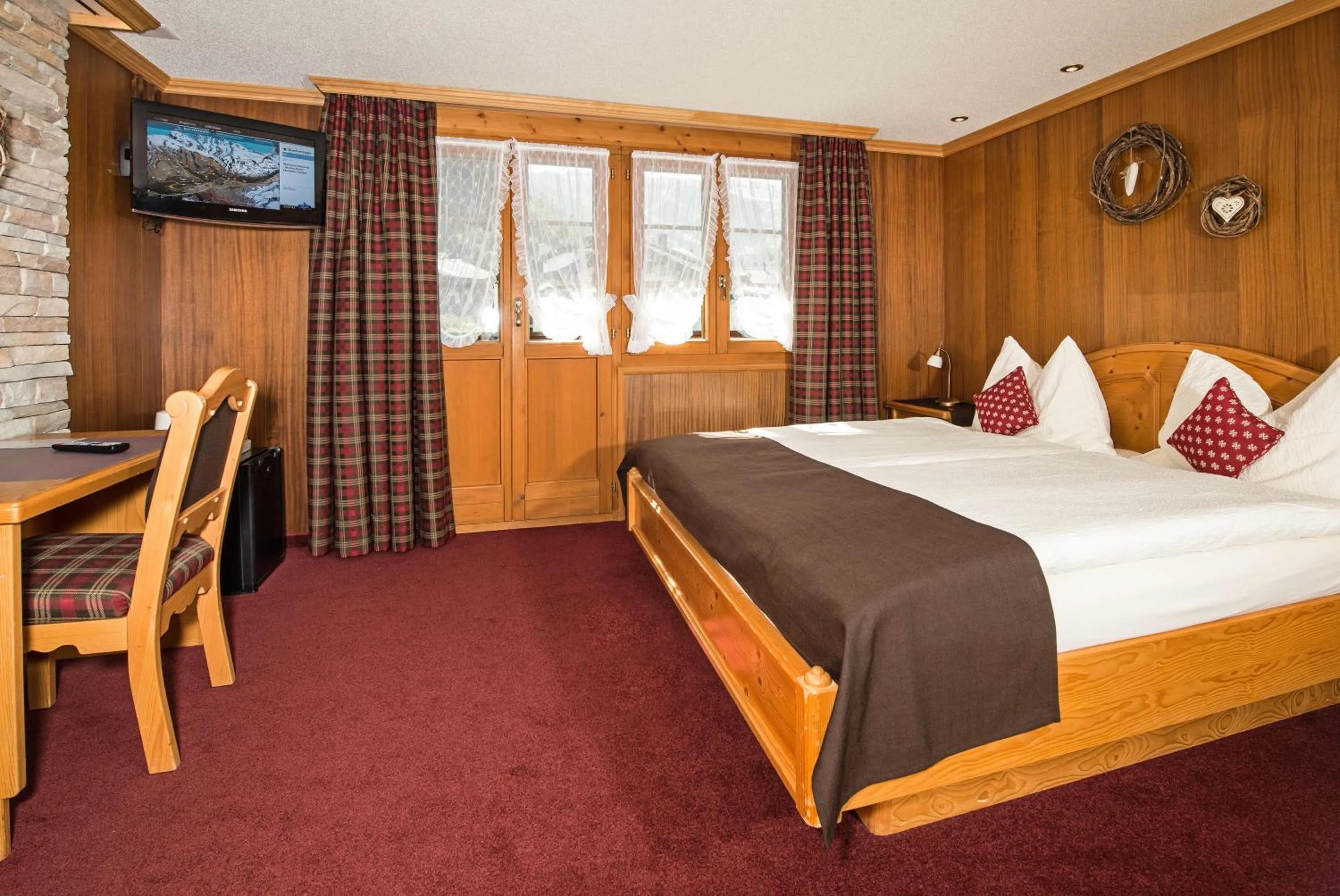 Photo of the whole room in Hotel Dufour Alpin Superior - Adults only