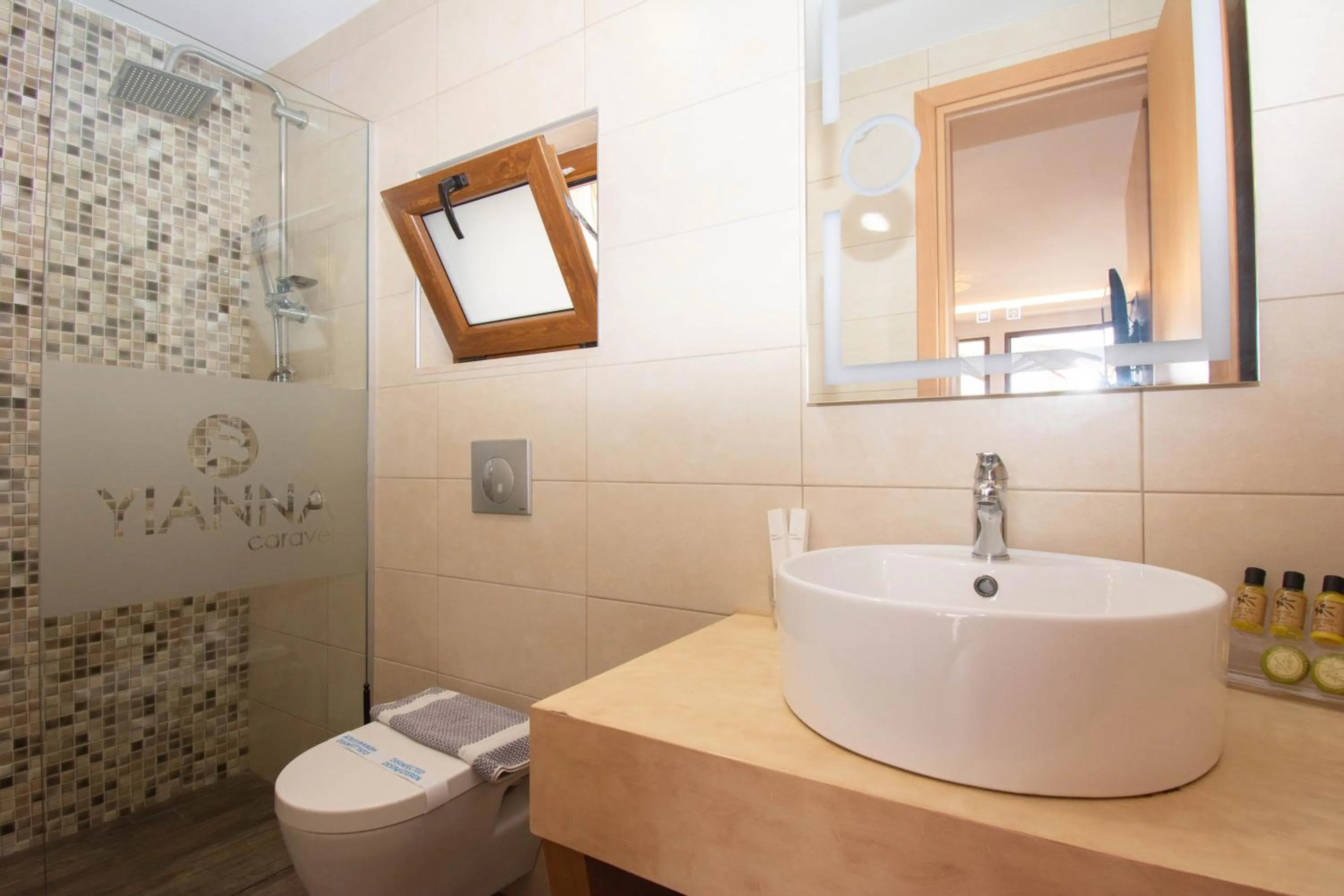 Bathroom in Yianna Caravel Suites "by Checkin" adults only