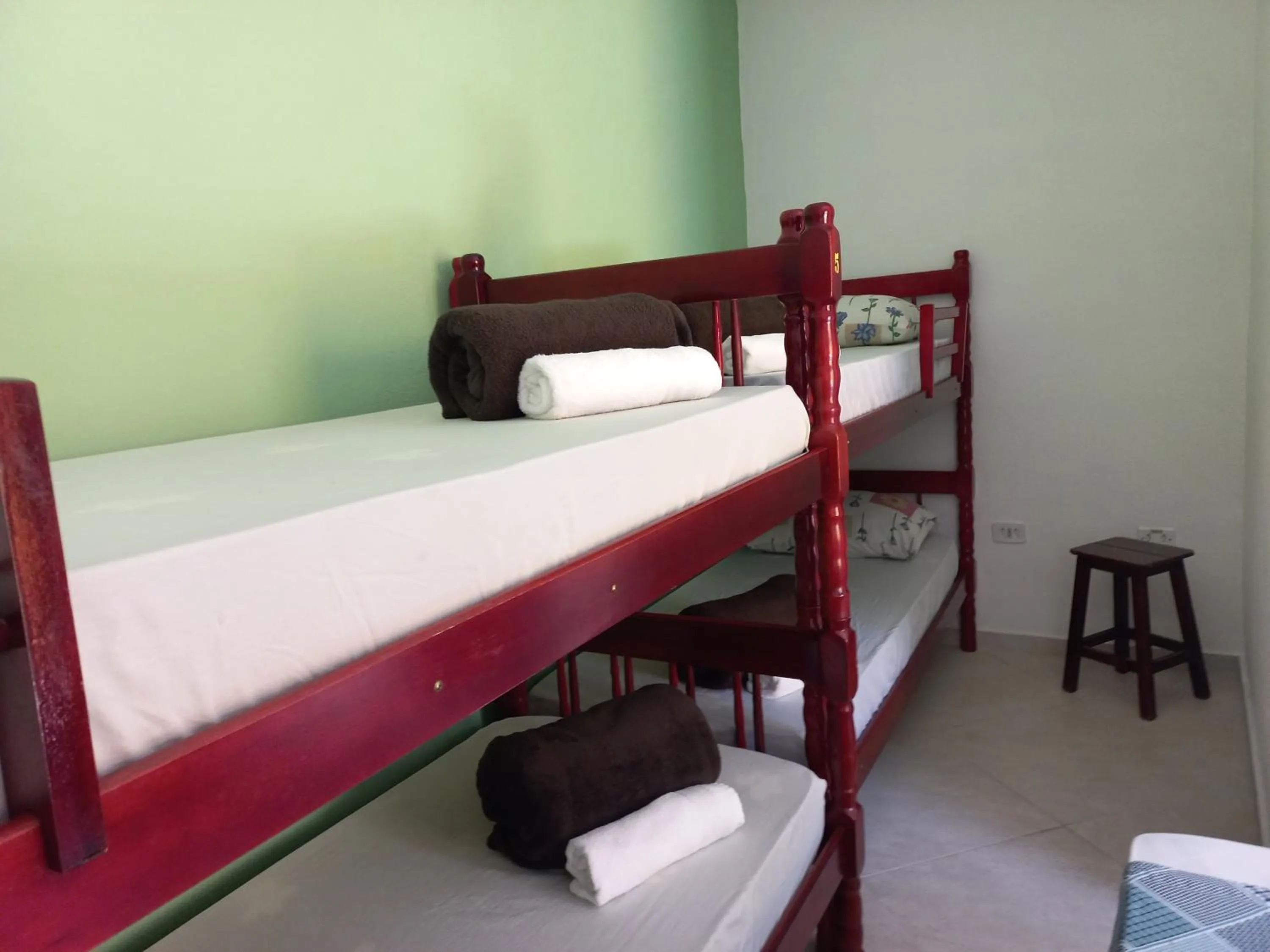 Bed in Suítes Cantinho do Sossego Ubatuba