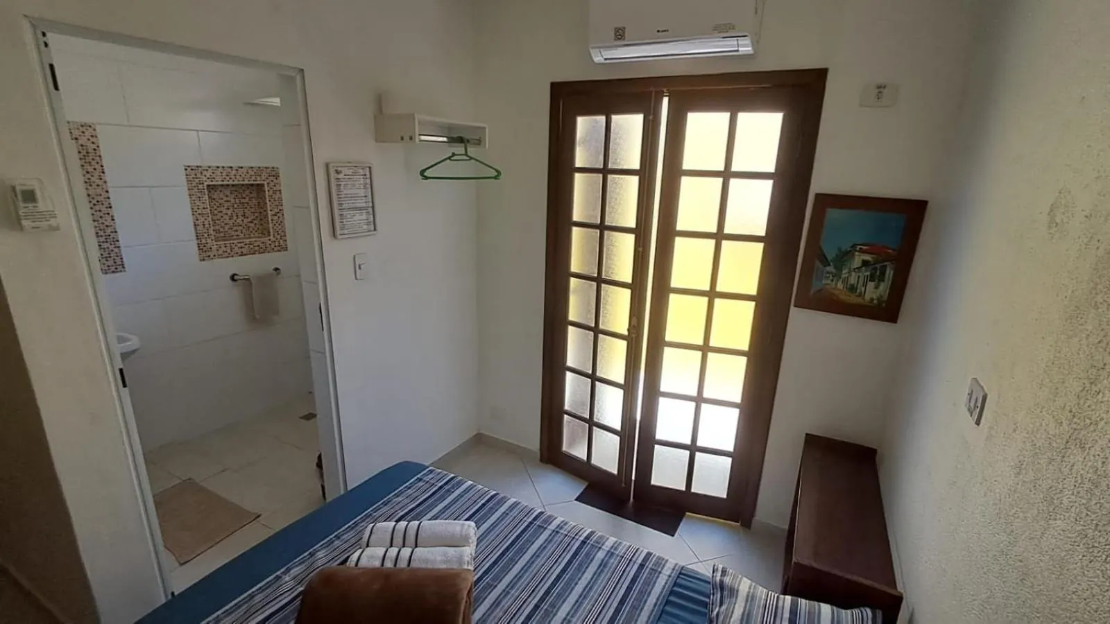 Bed in Suítes Cantinho do Sossego Ubatuba