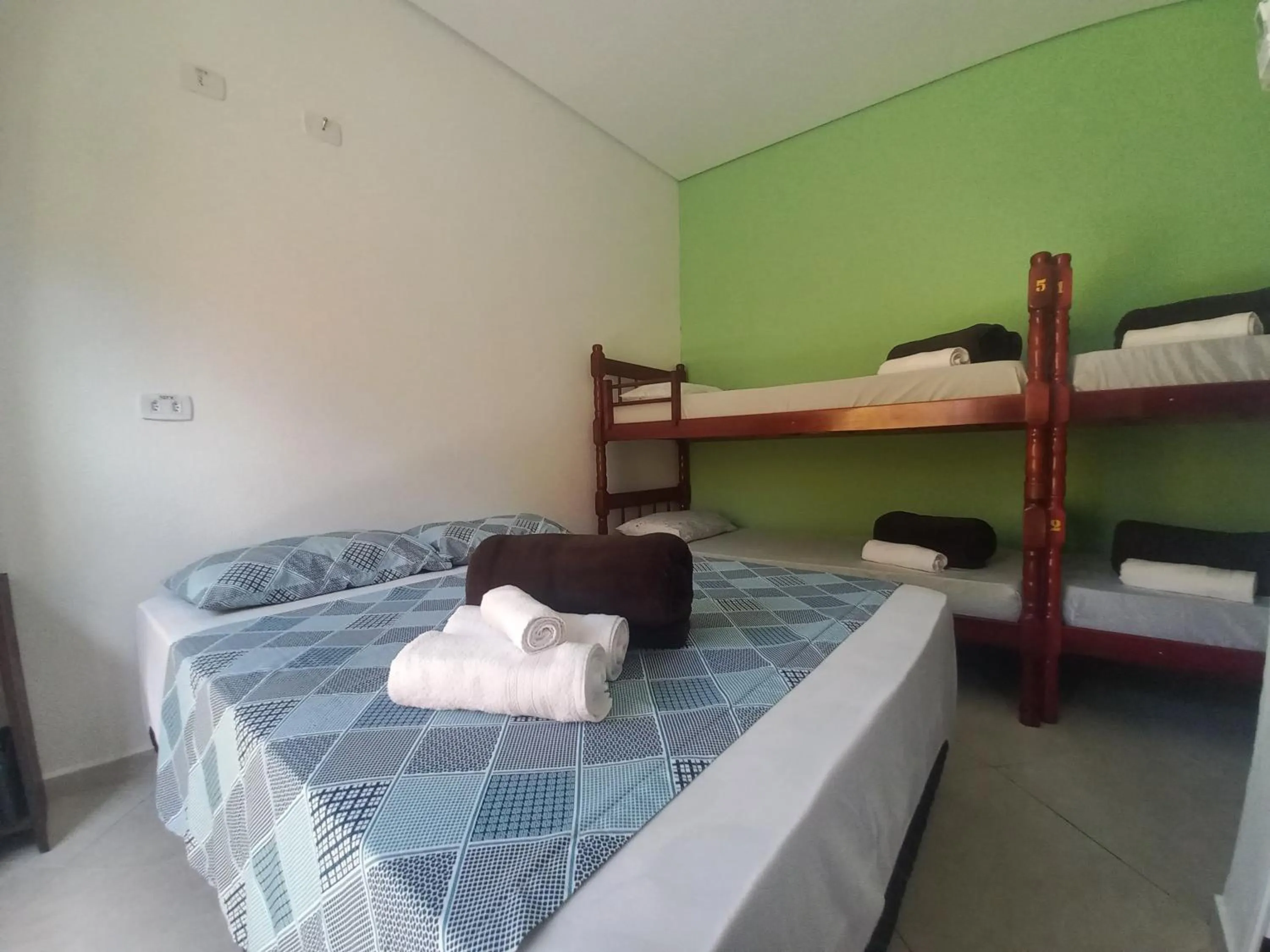 Bed in Suítes Cantinho do Sossego Ubatuba