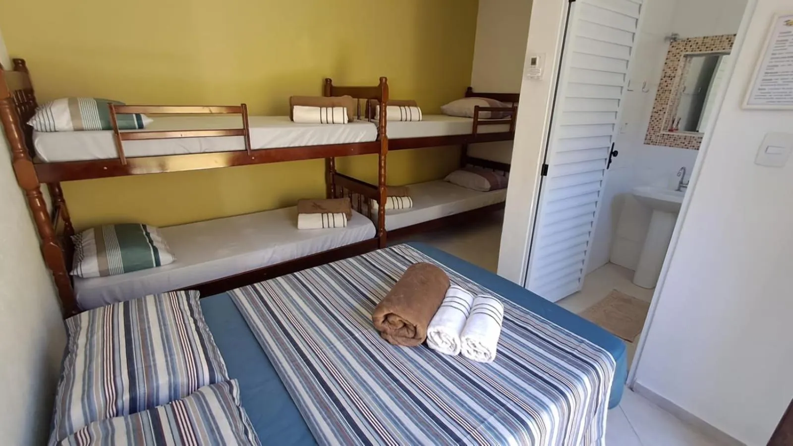 Bed in Suítes Cantinho do Sossego Ubatuba