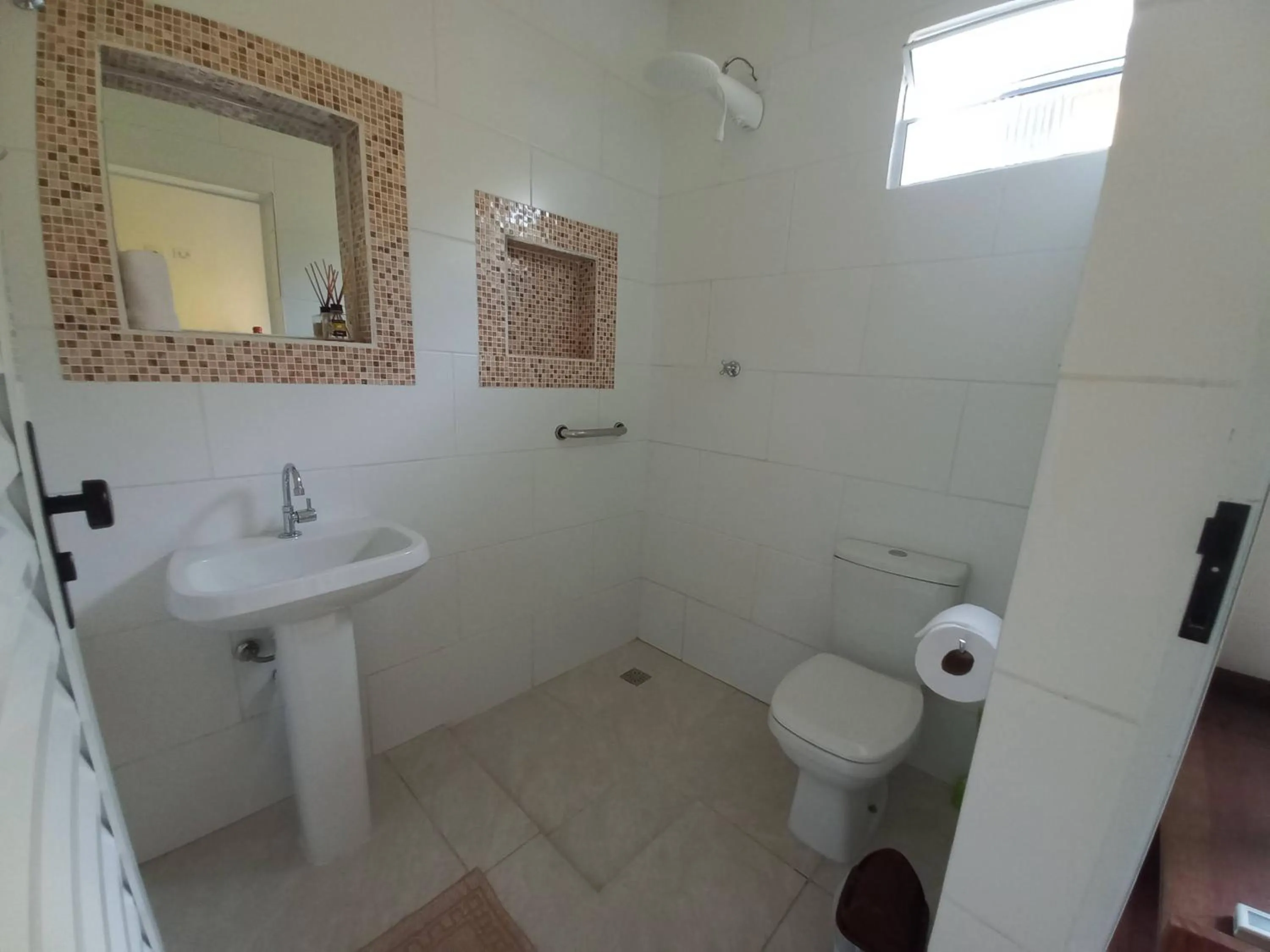 Shower in Suítes Cantinho do Sossego Ubatuba