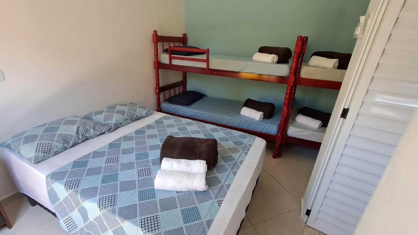 Bed in Suítes Cantinho do Sossego Ubatuba