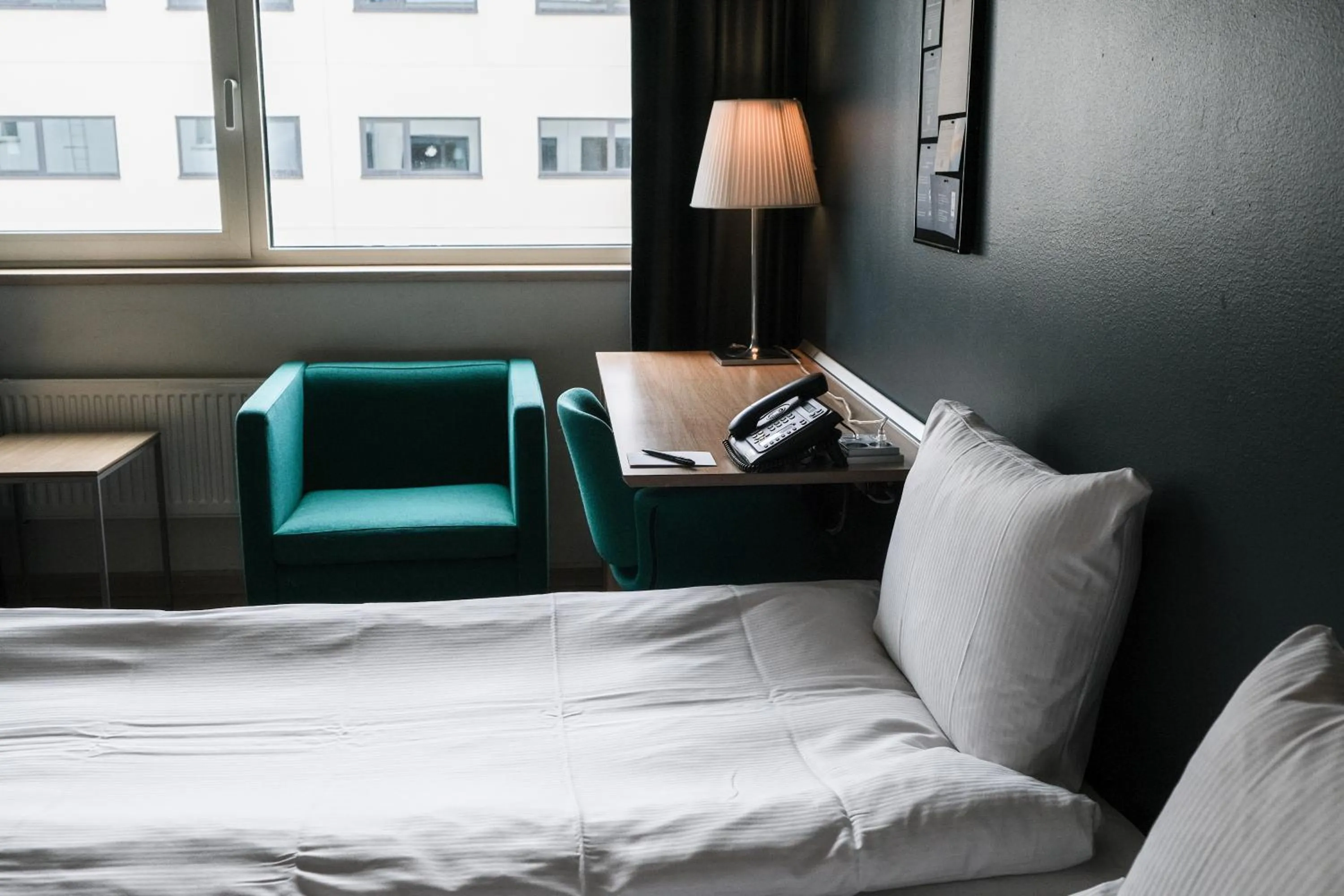 Bed in Clarion Hotel Sign