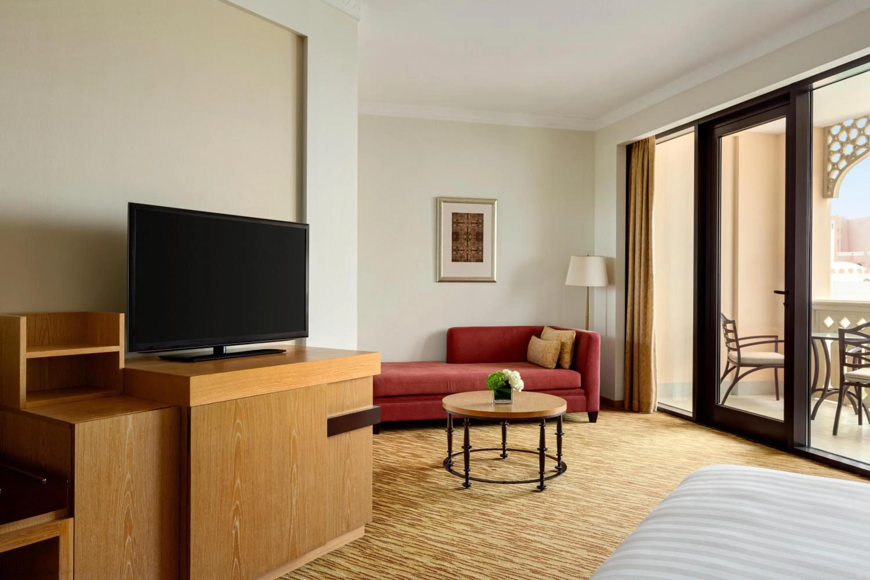 Living room, Bed in Hilton Muscat Al Bandar