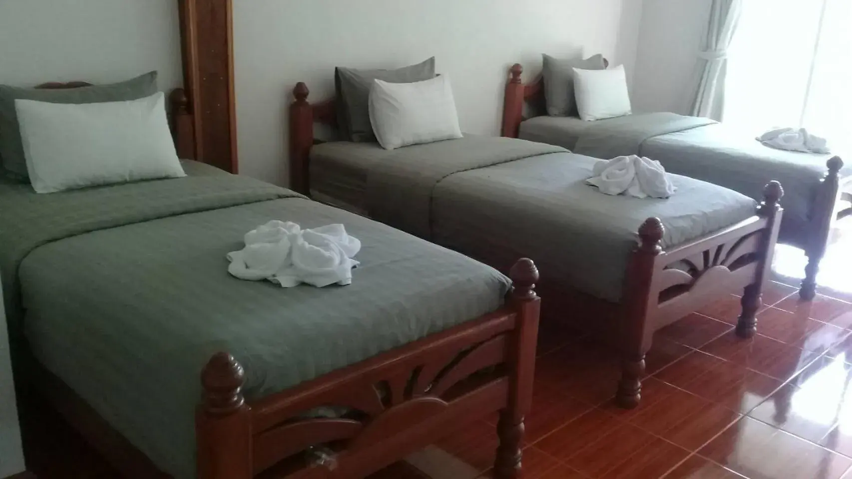 Triple Room with Private Bathroom in Maingern Maithong Resort Triple Room with Private Bathroom in Maingern Maithong Resort