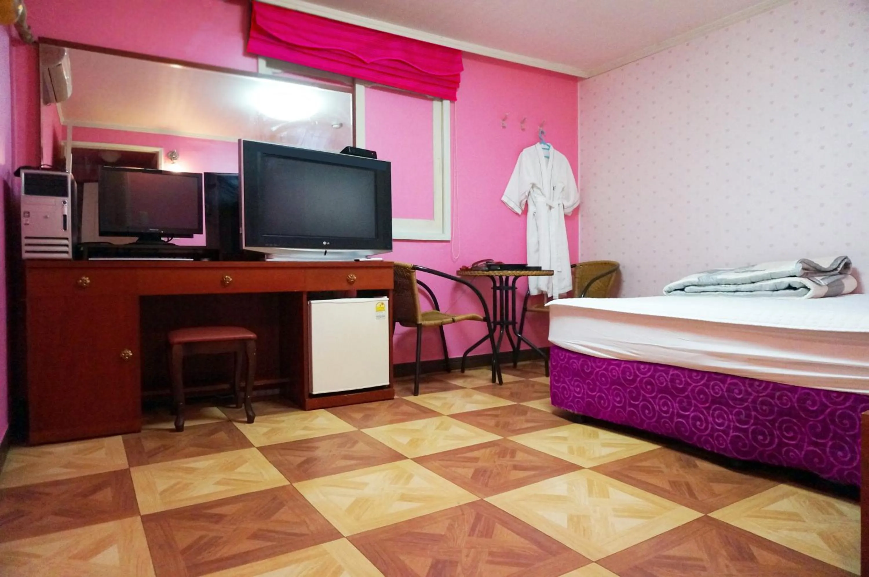 Seating area, Bed in J Motel Gwangalli Busan