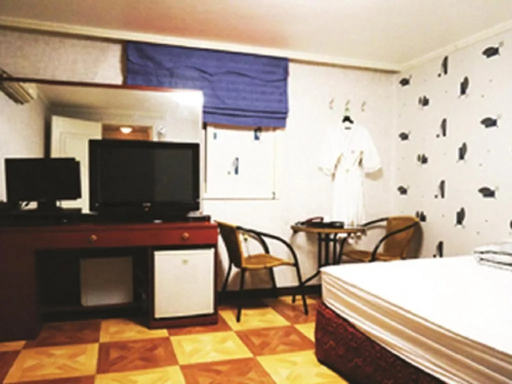 Seating area, Bed in J Motel Gwangalli Busan