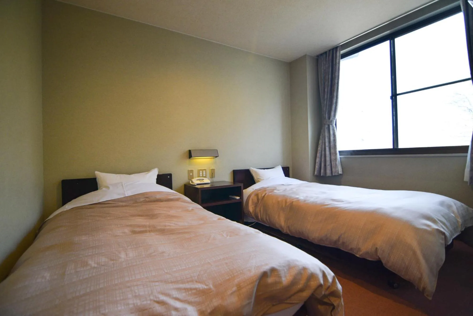 Bed in Hotel Yamabuki