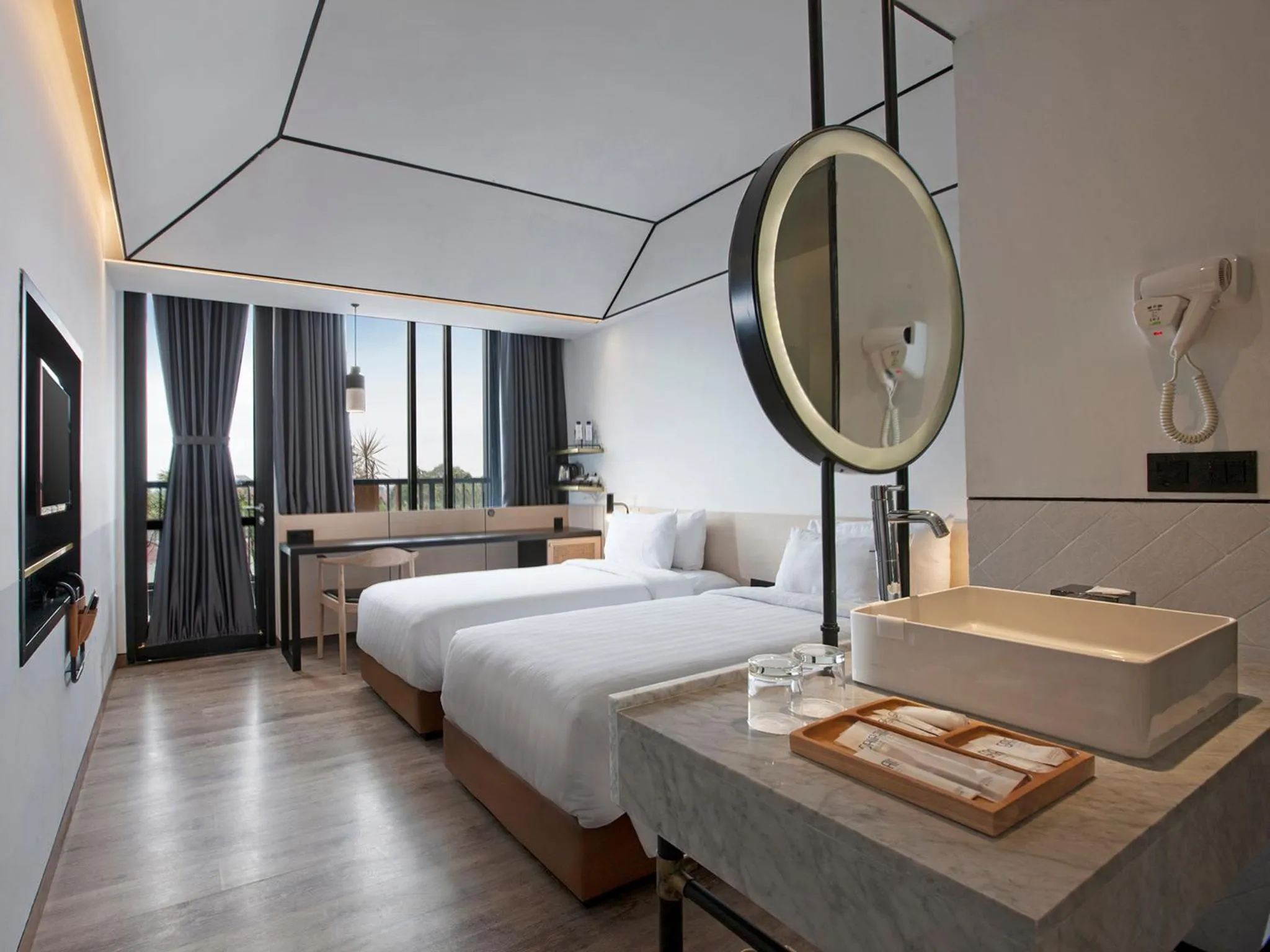 Bed in GAIA Cosmo Hotel