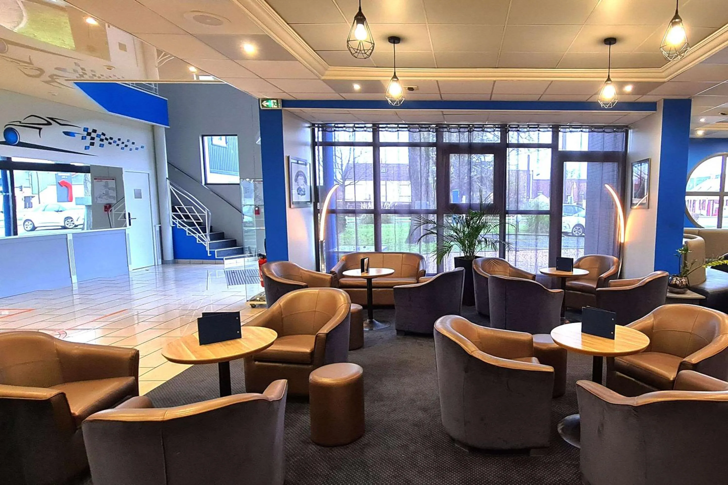 Lobby or reception in Hotel Le Circuit Le Mans