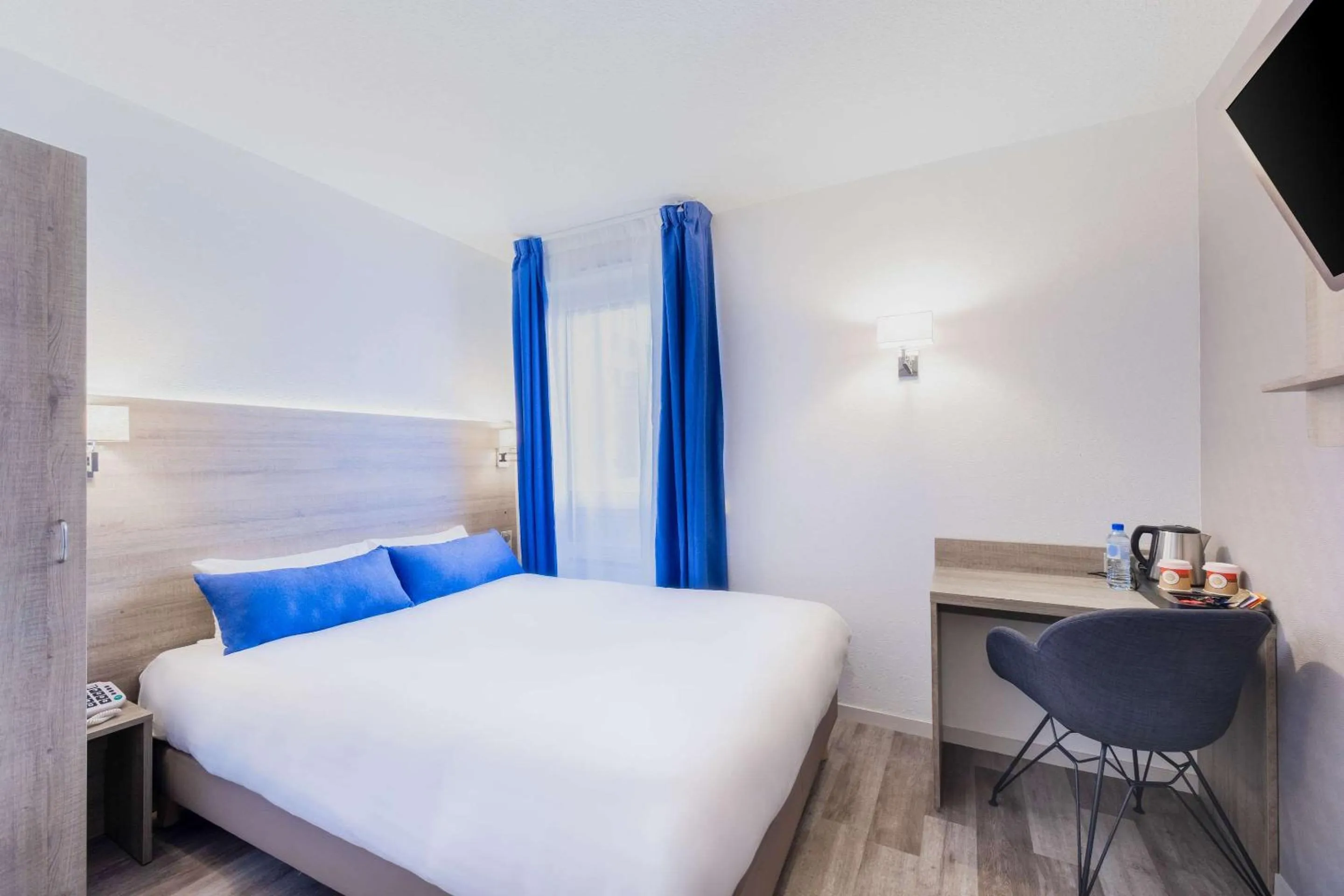 Photo of the whole room, Bed in Hotel Le Circuit Le Mans