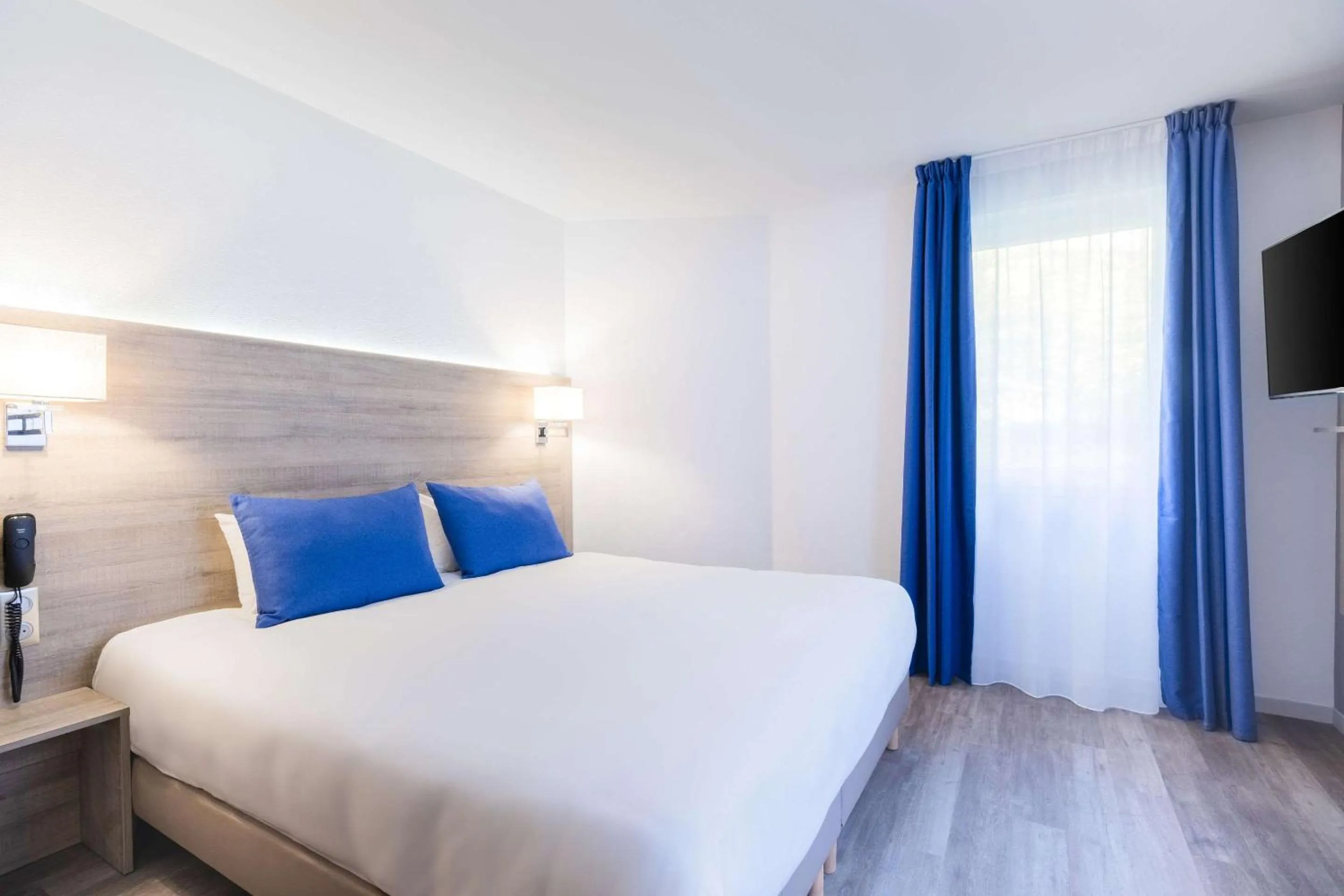 Photo of the whole room, Bed in Hotel Le Circuit Le Mans