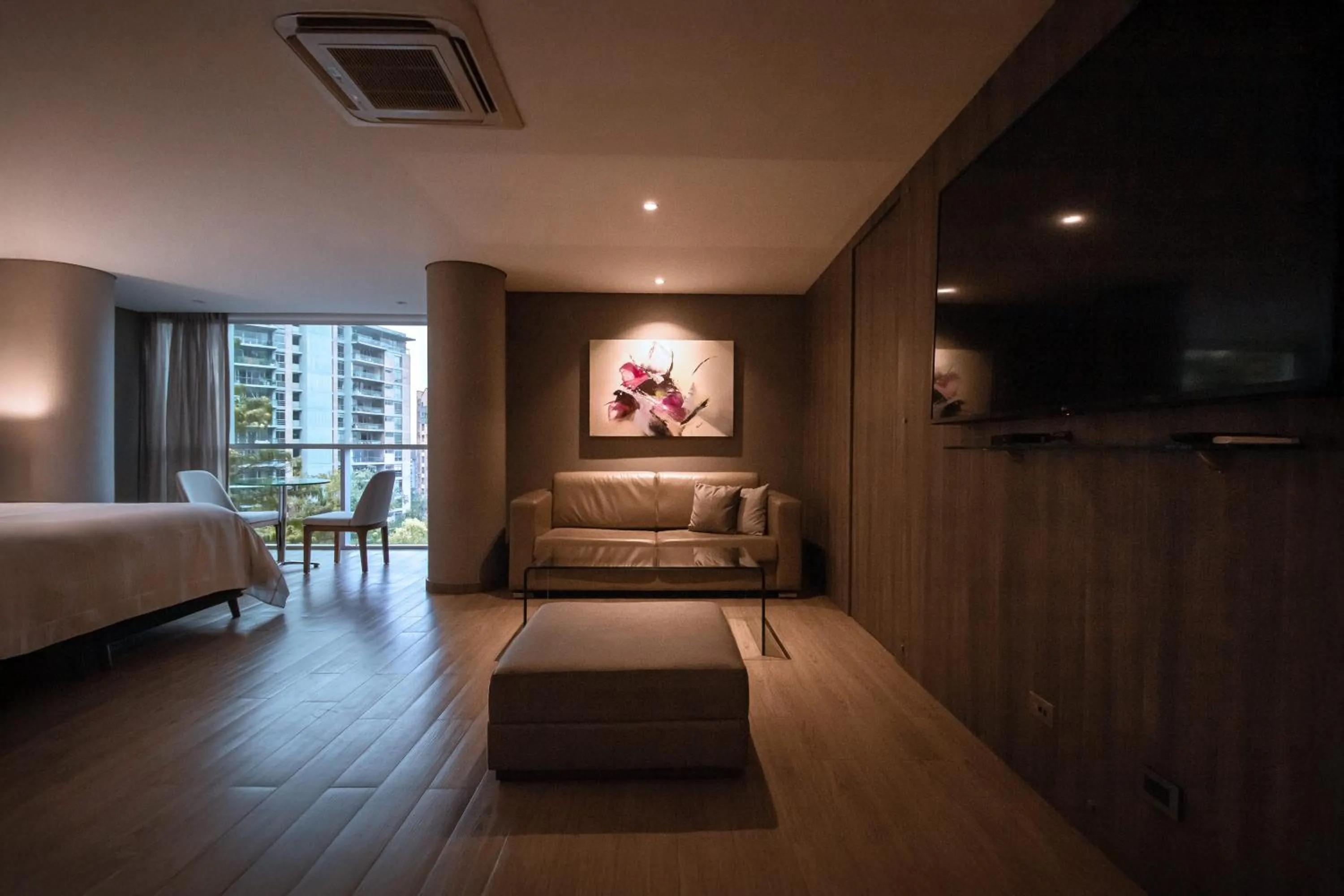 Living room, Bed in Binn Hotel