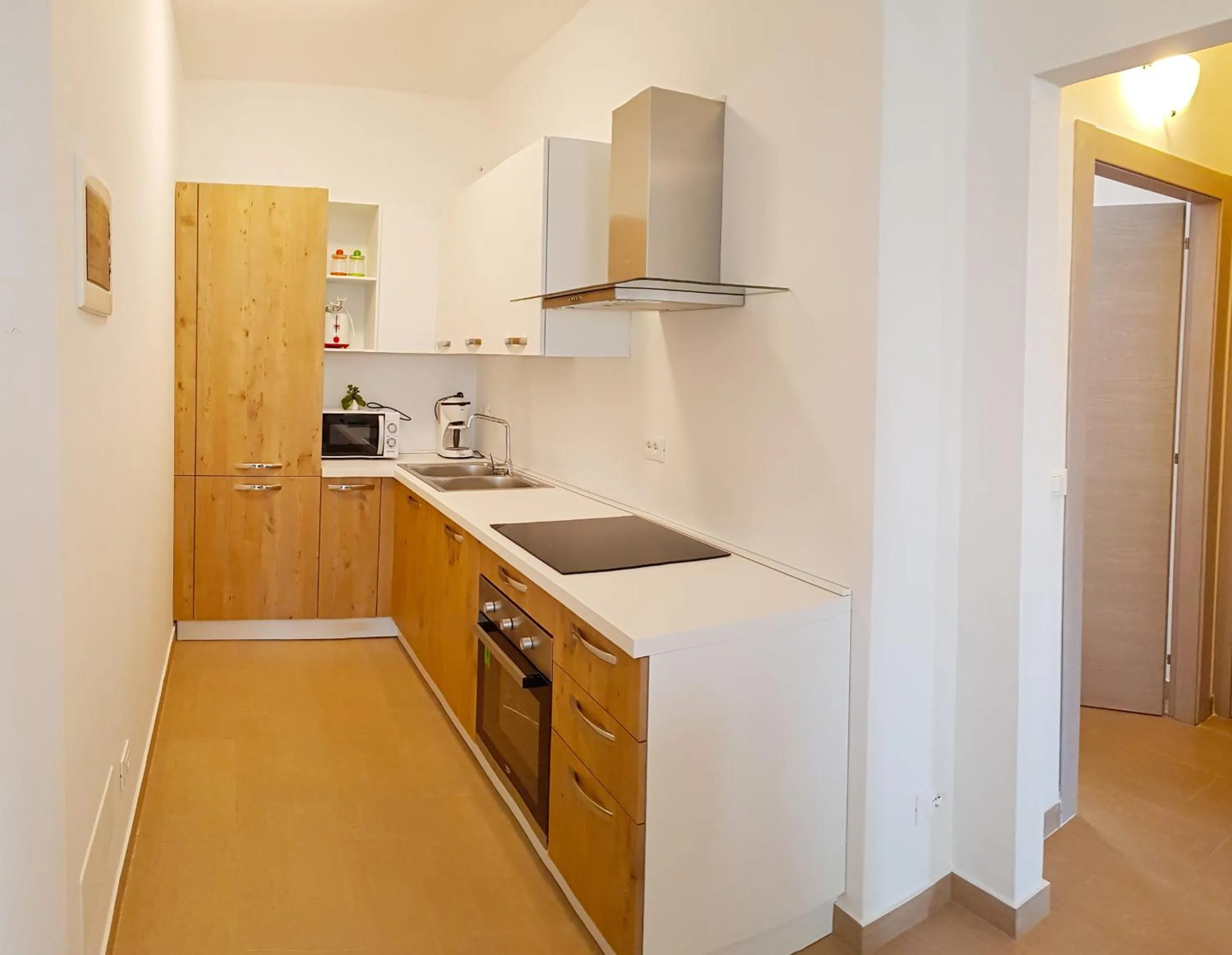 Kitchen or kitchenette in Casa Gina Garden and view by Gardadomusmea