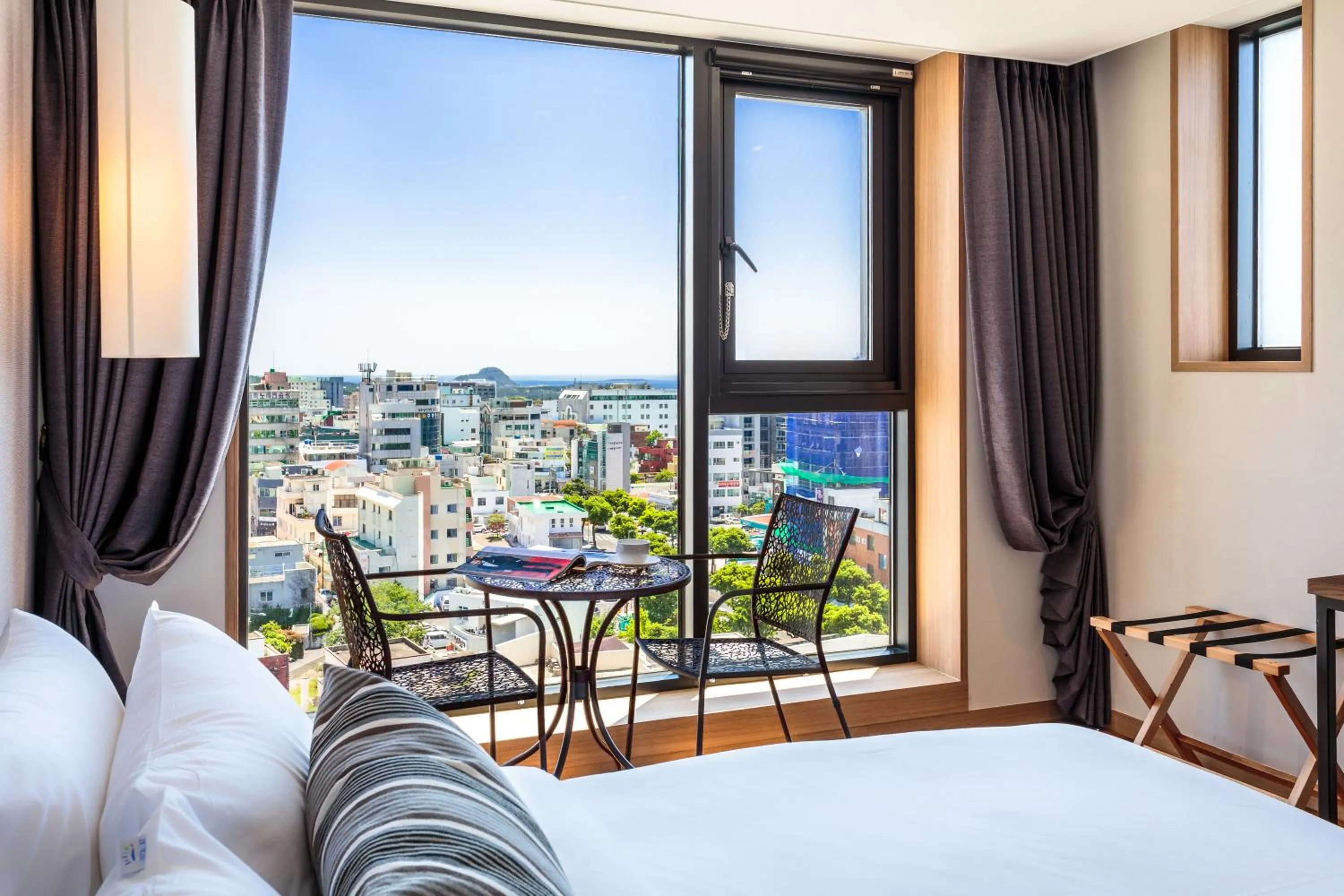 Bedroom, Balcony/Terrace in Hotel Alegria Seogwipo