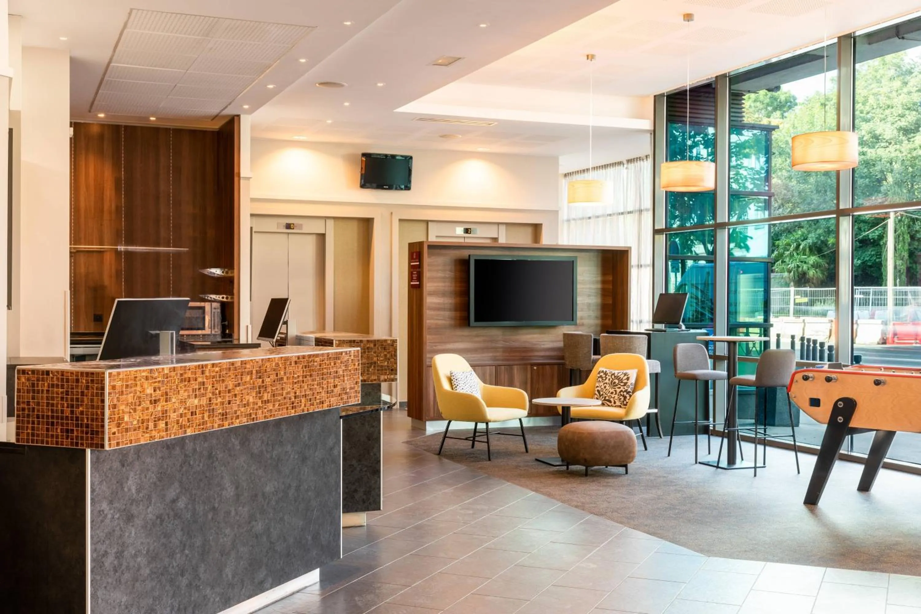 Lobby or reception in Courtyard by Marriott Paris Saint Denis