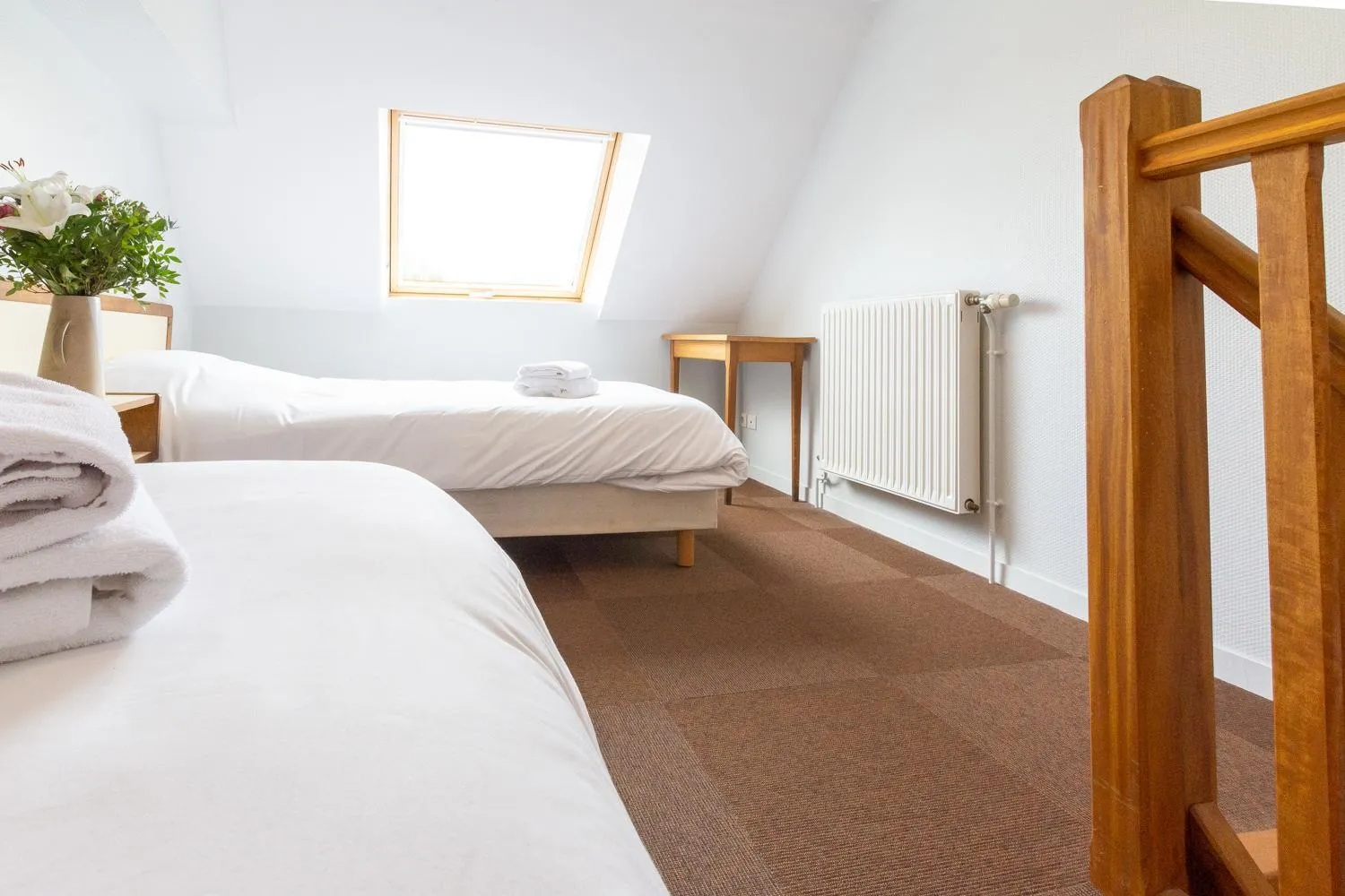 Bed in Logis Hôtel & Restaurant - Le Saint-Louis