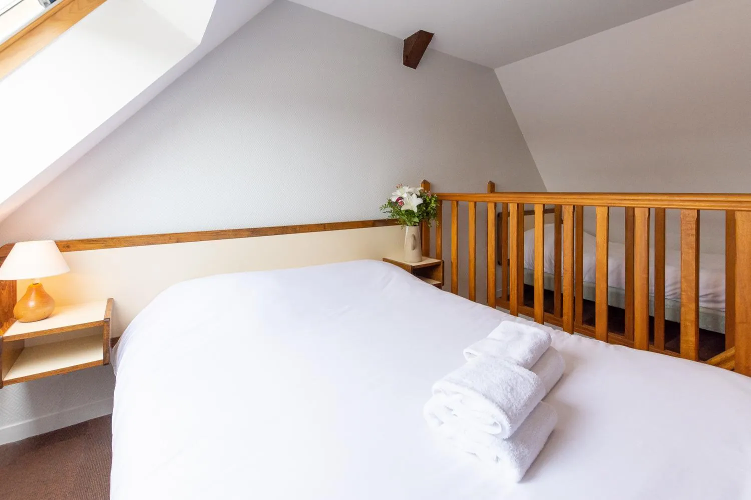 Bed in Logis Hôtel & Restaurant - Le Saint-Louis