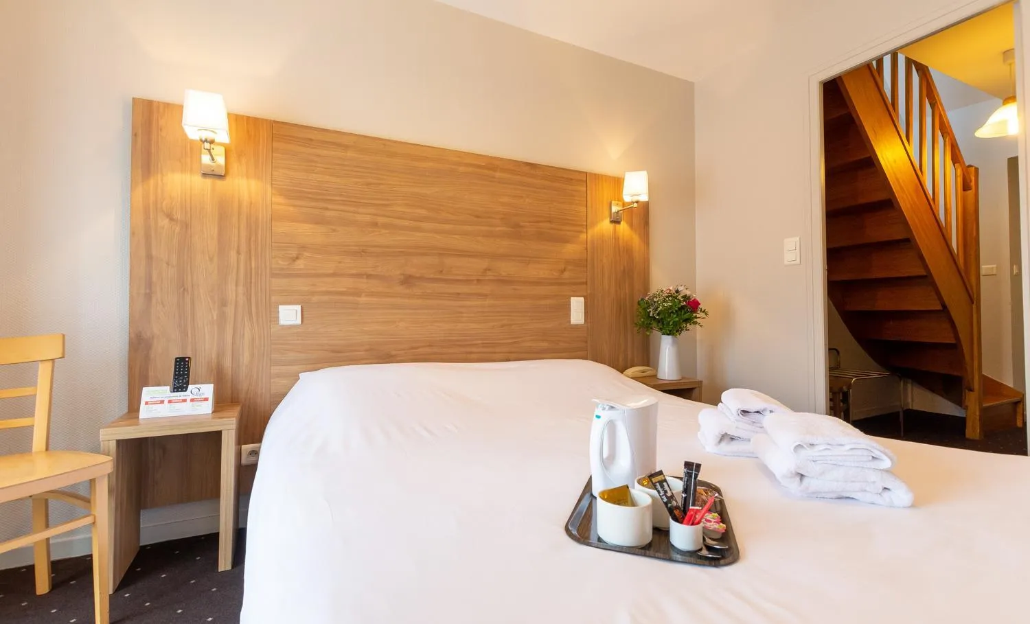 Bed in Logis Hôtel & Restaurant - Le Saint-Louis