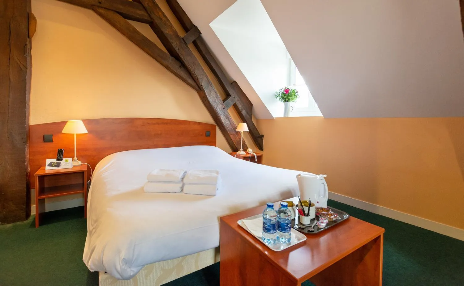 Bed in Logis Hôtel & Restaurant - Le Saint-Louis