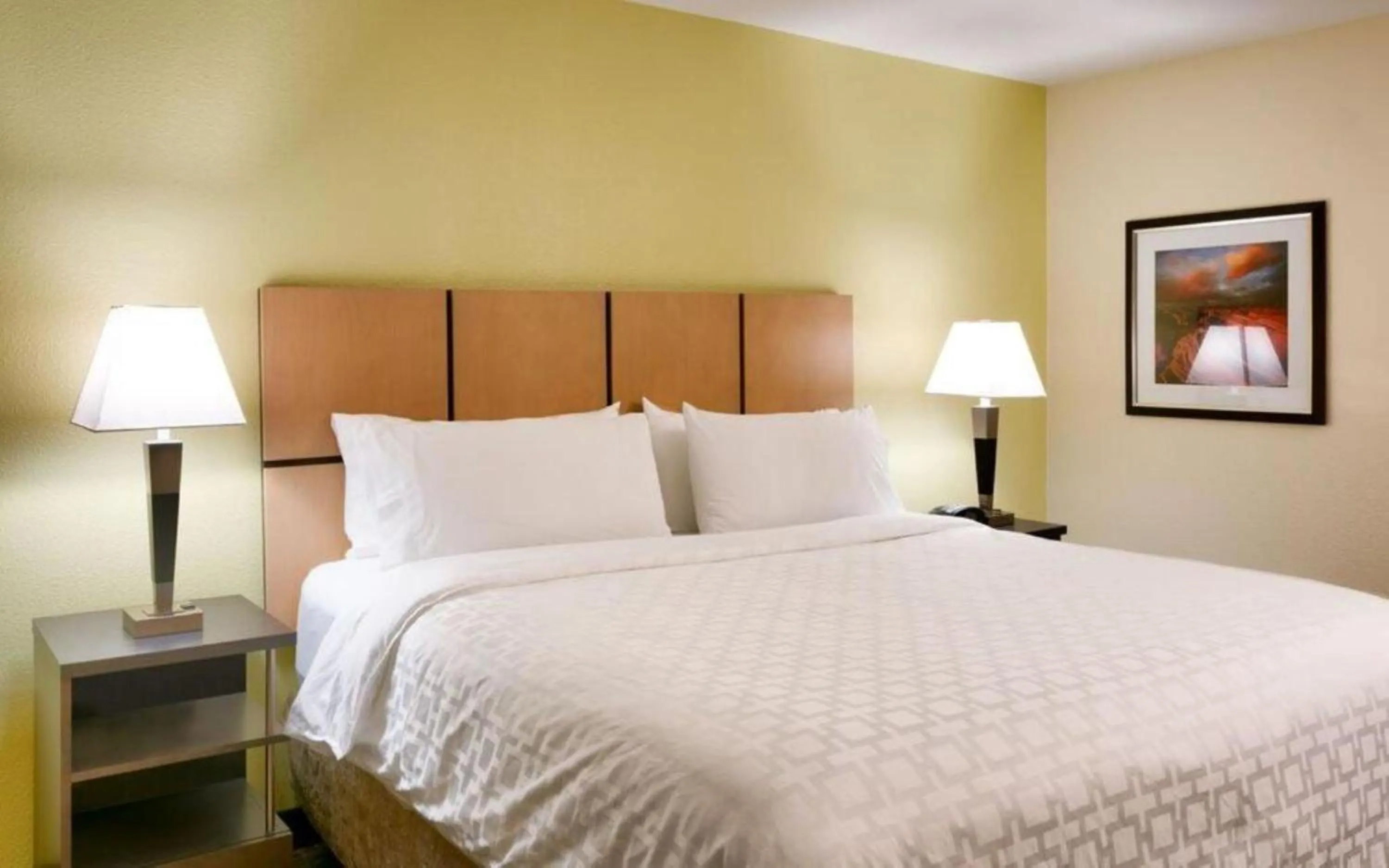 Bed in Candlewood Suites Plano East by IHG
