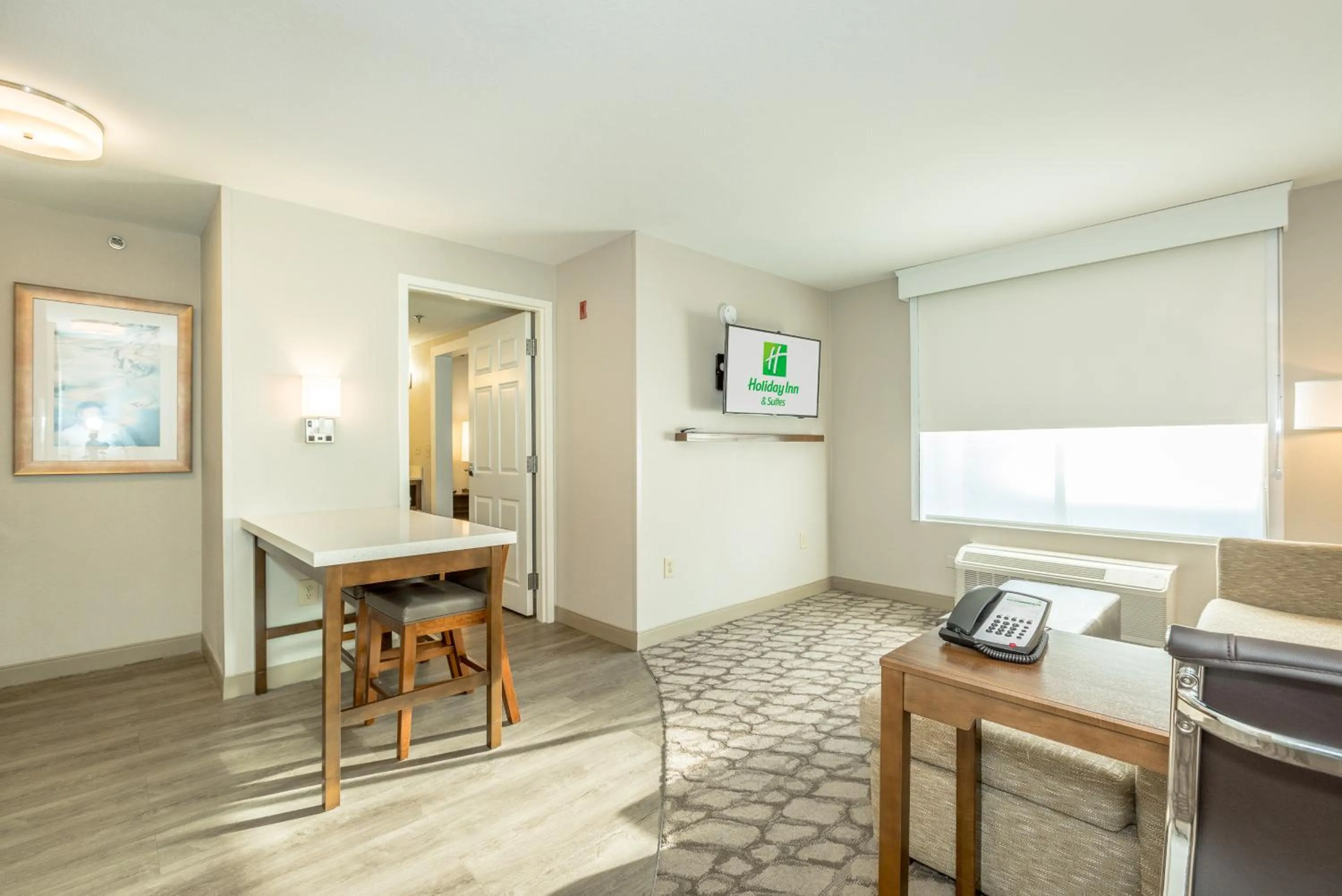 Living room in Holiday Inn Hotel and Suites Peachtree City by IHG