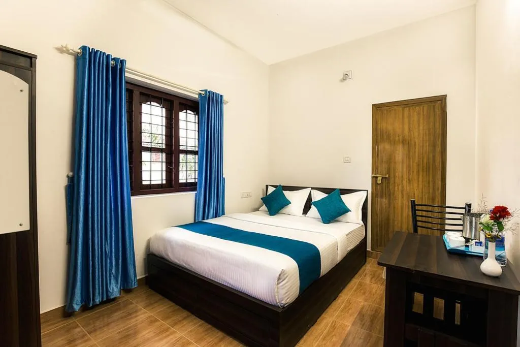 Bed in Wayanad Three Roots Holiday Home Resort