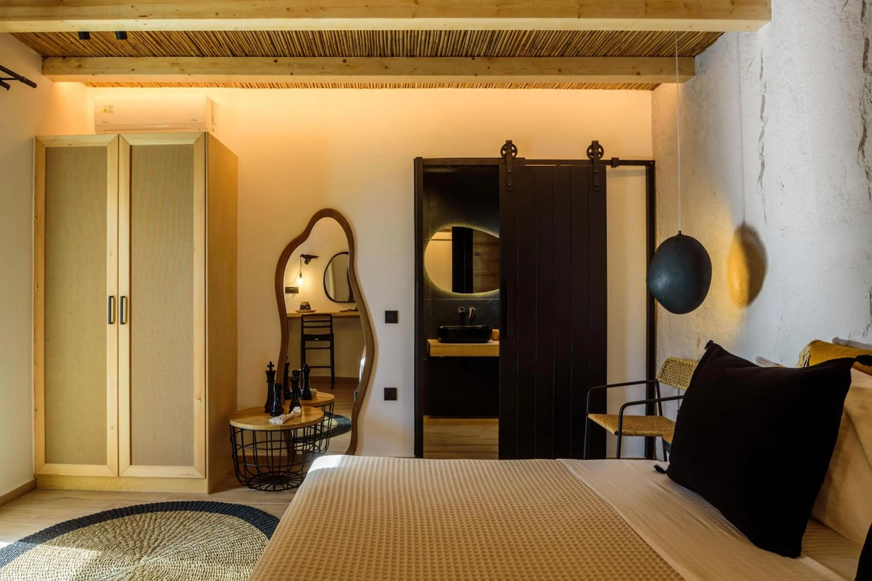 Bed in Olive Mykonos Villas