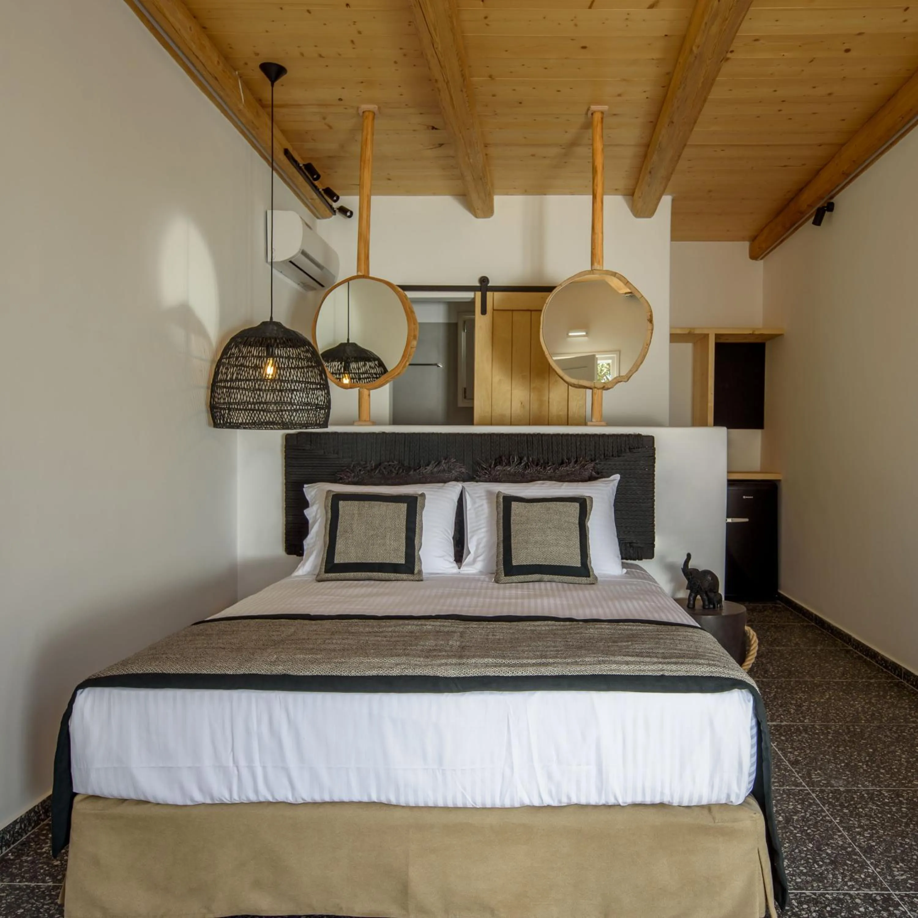 Bed in Olive Mykonos Villas