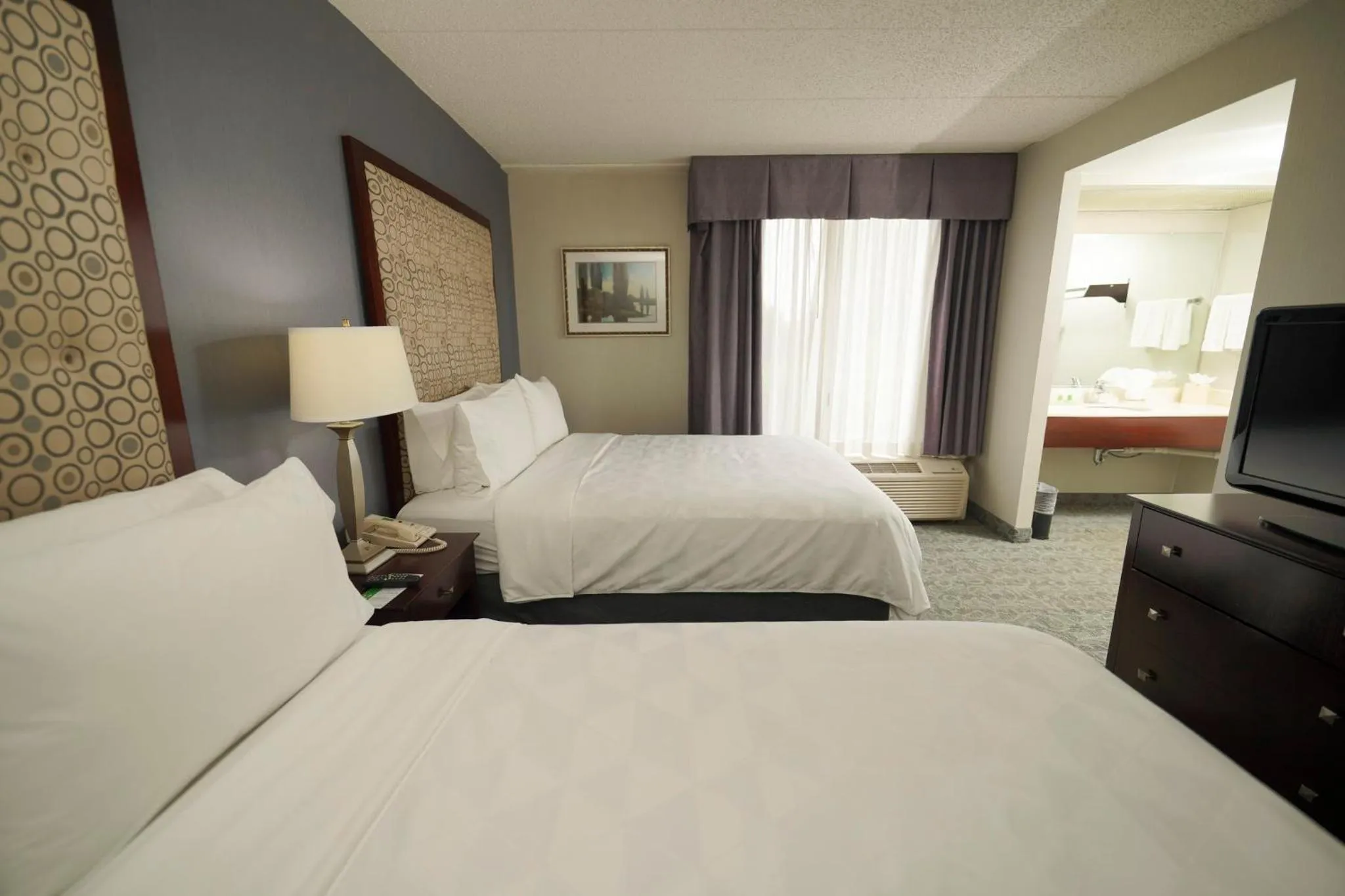 Bedroom, Bed in Holiday Inn & Suites Chicago-Carol Stream Wheaton by IHG