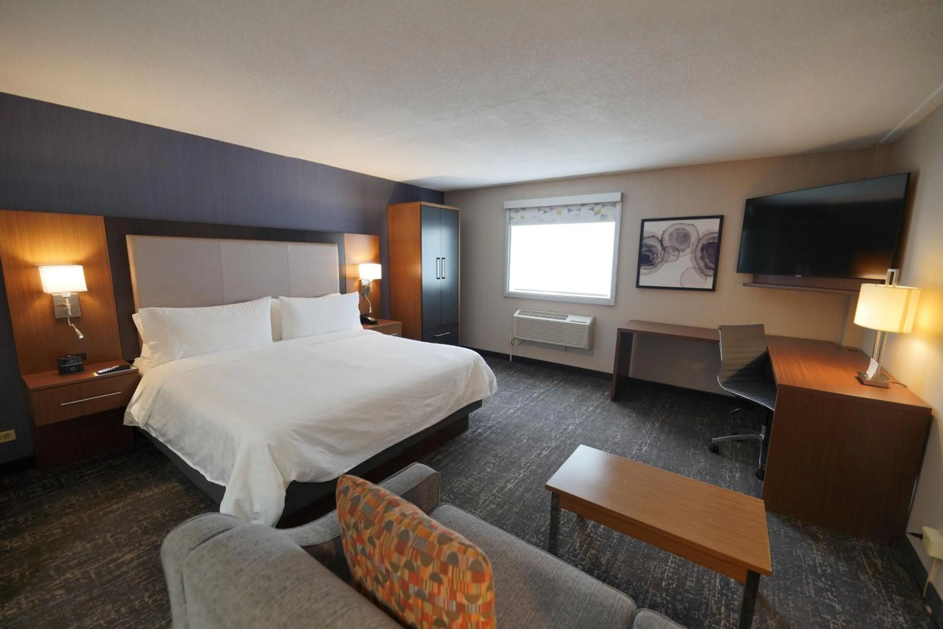 Bedroom, Bed in Holiday Inn & Suites Chicago-Carol Stream Wheaton by IHG